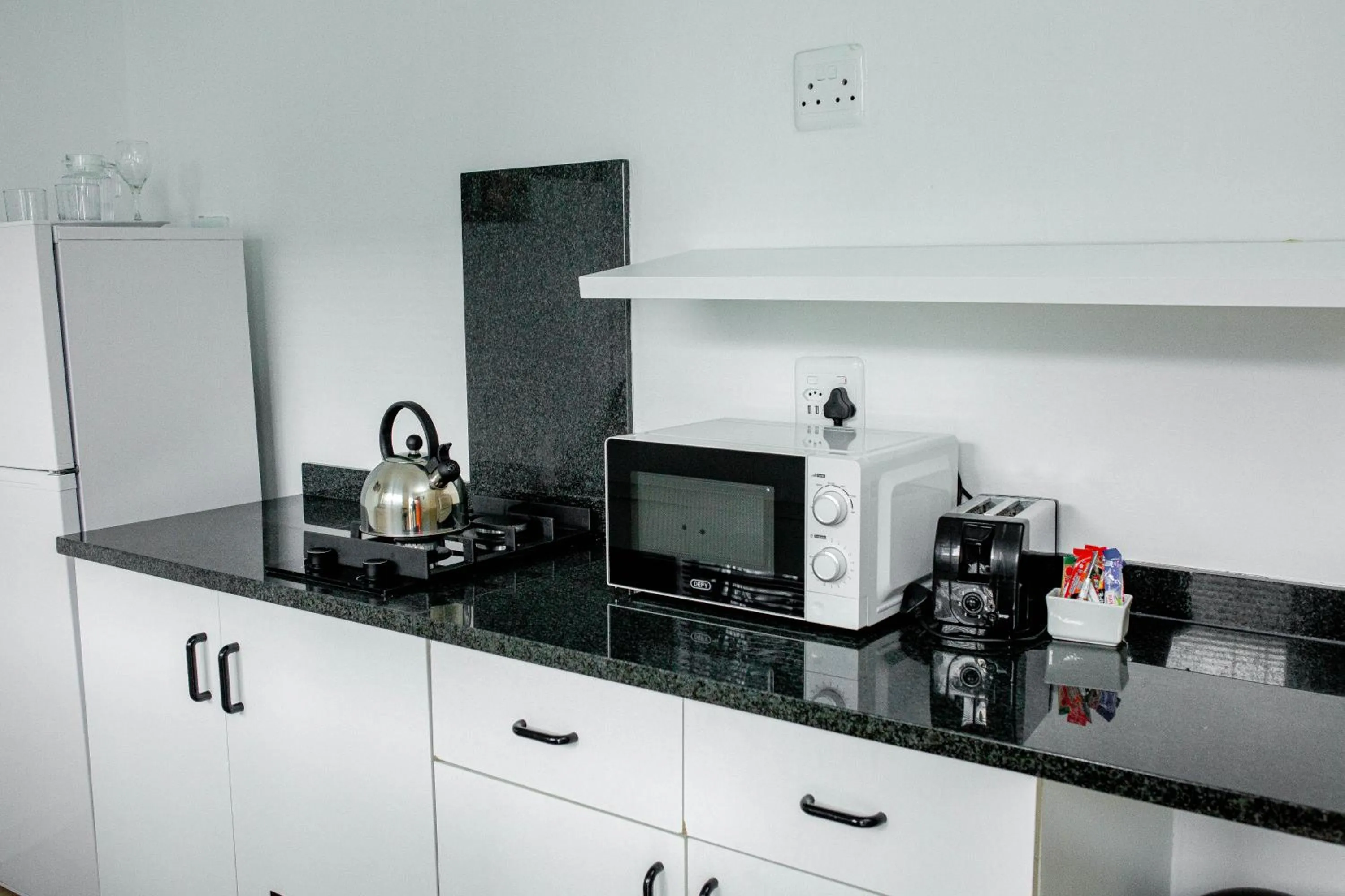 Kitchen or kitchenette in Vetho 1 Apartments OR Tambo Airport