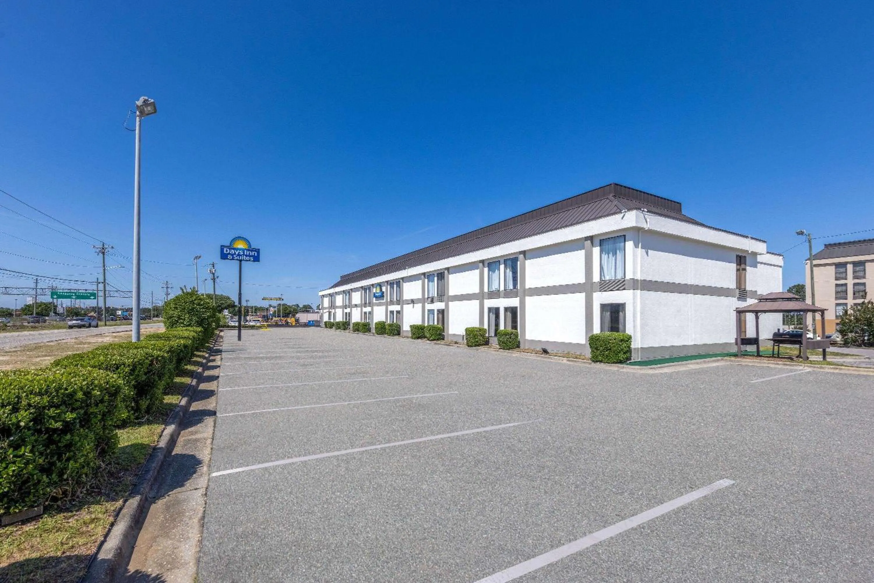 Property building in Days Inn & Suites by Wyndham Fort Bragg/Cross Creek Mall