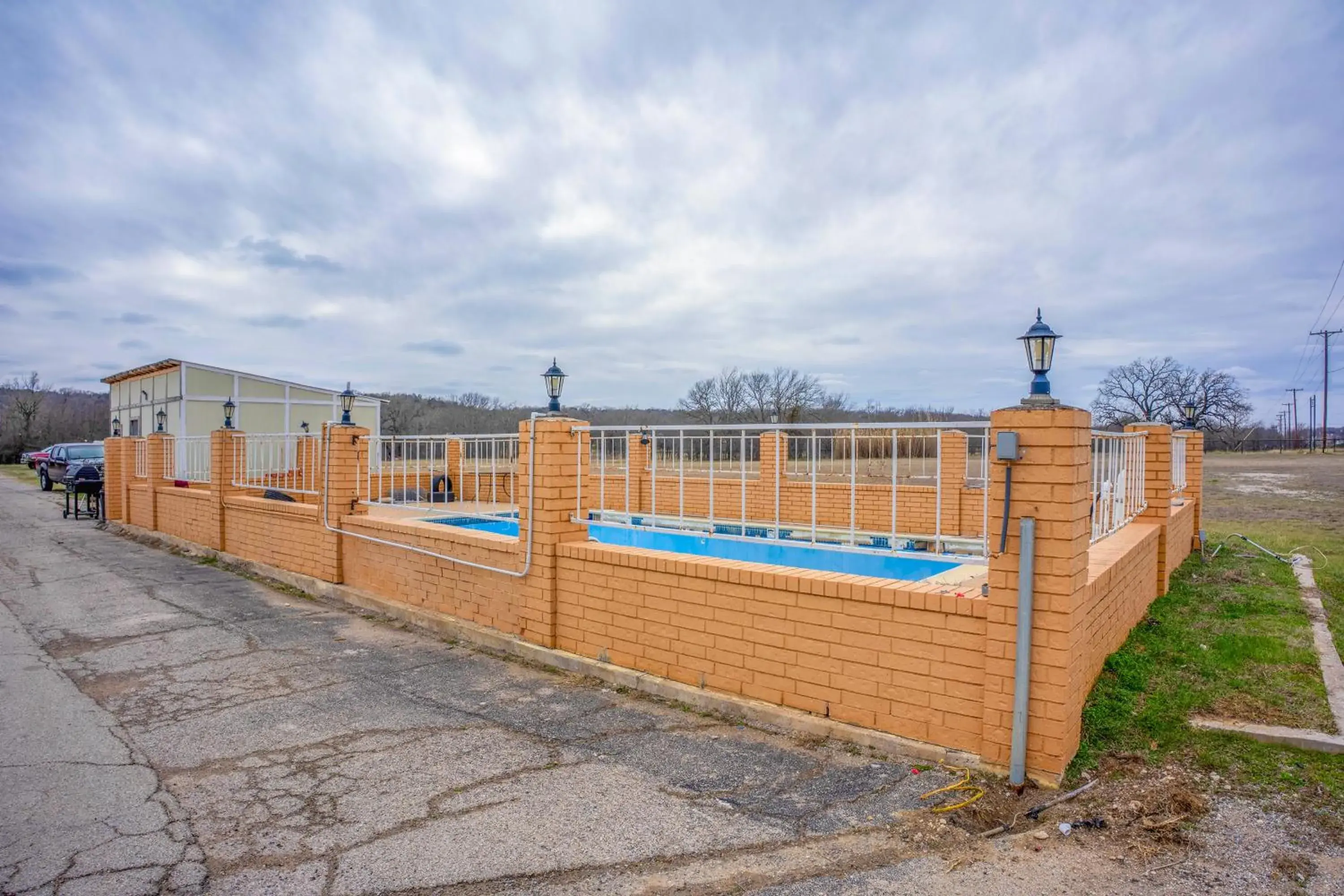 Swimming pool in Executive Inn By OYO Mineral Wells US-180 Swimming pool in Executive Inn By OYO Mineral Wells US-180