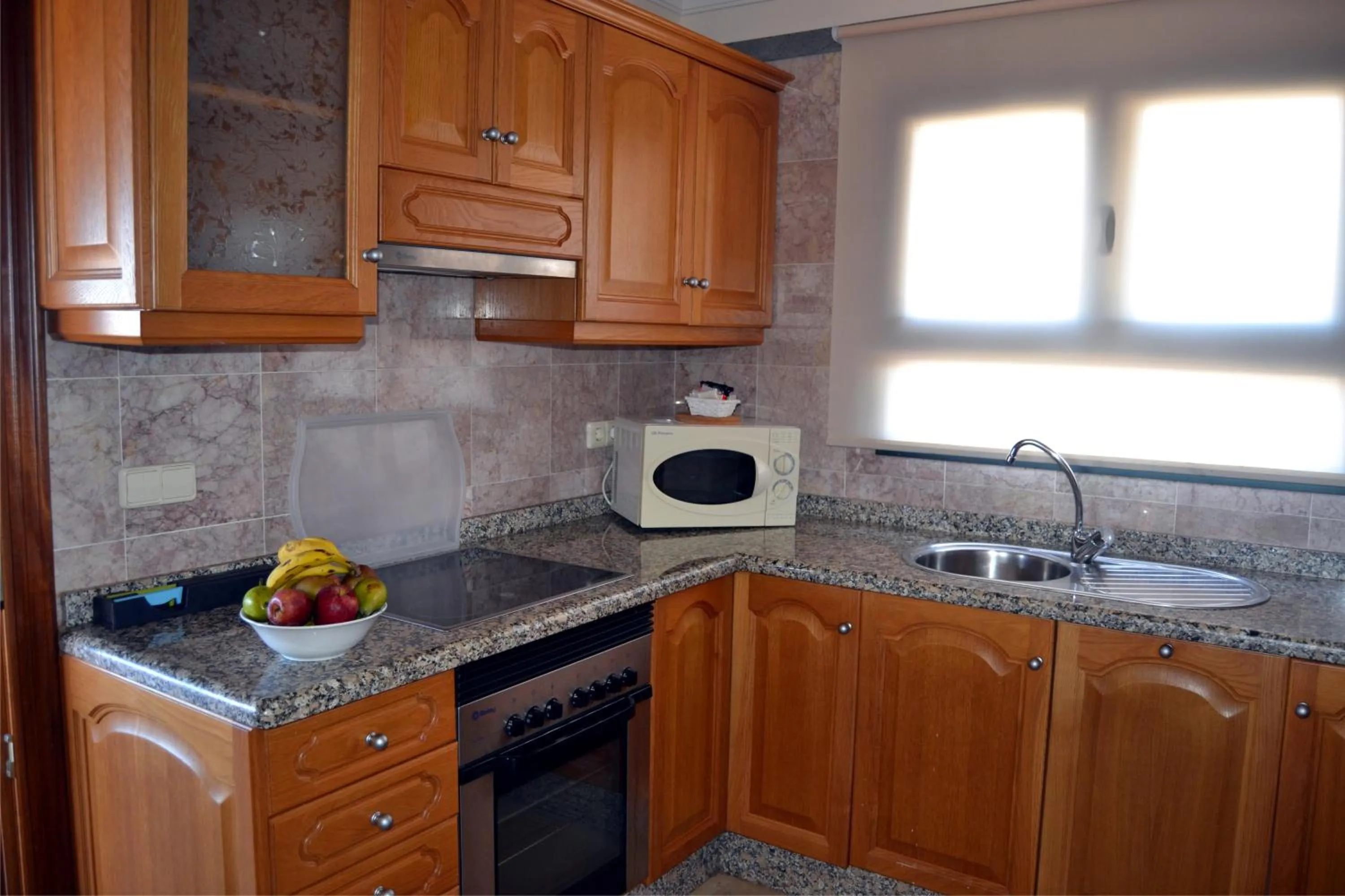 Kitchen or kitchenette in Villas Coral Deluxe