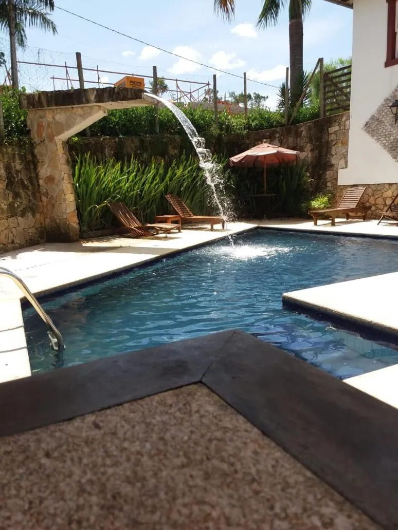 Swimming pool in Pousada Araujo Bazilio