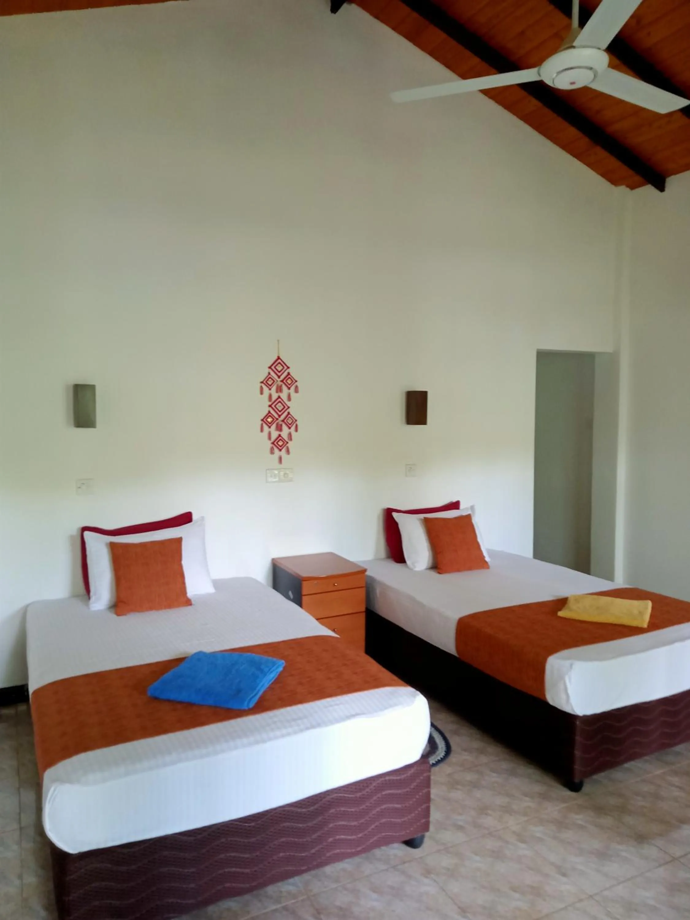 Bed in Kithmi Resort