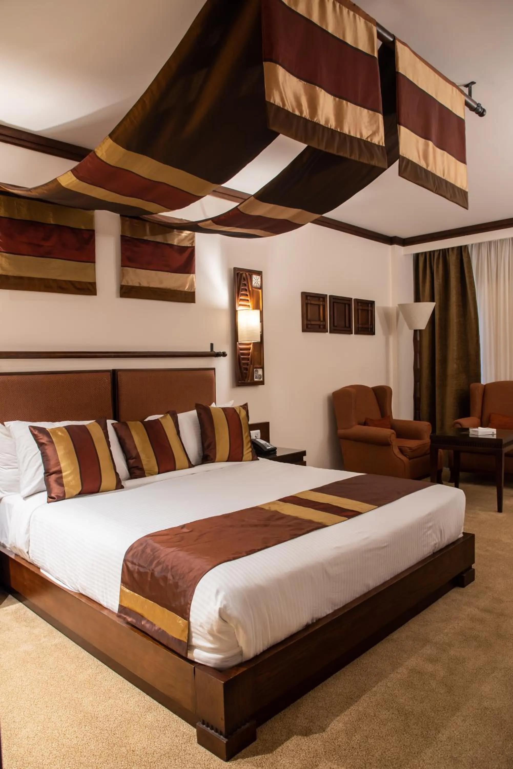 Bed in Africana Hotel & Spa