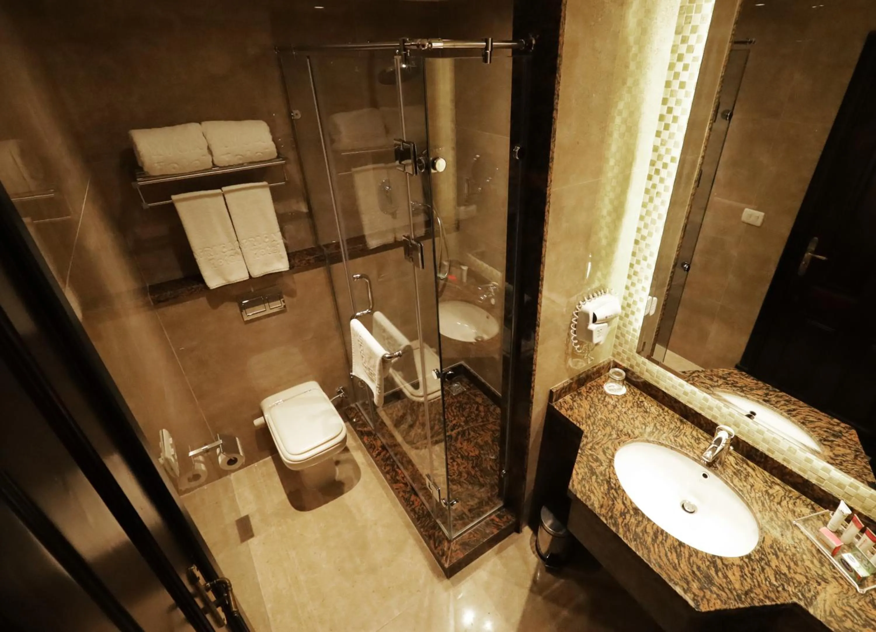 Toilet in Africana Hotel & Spa
