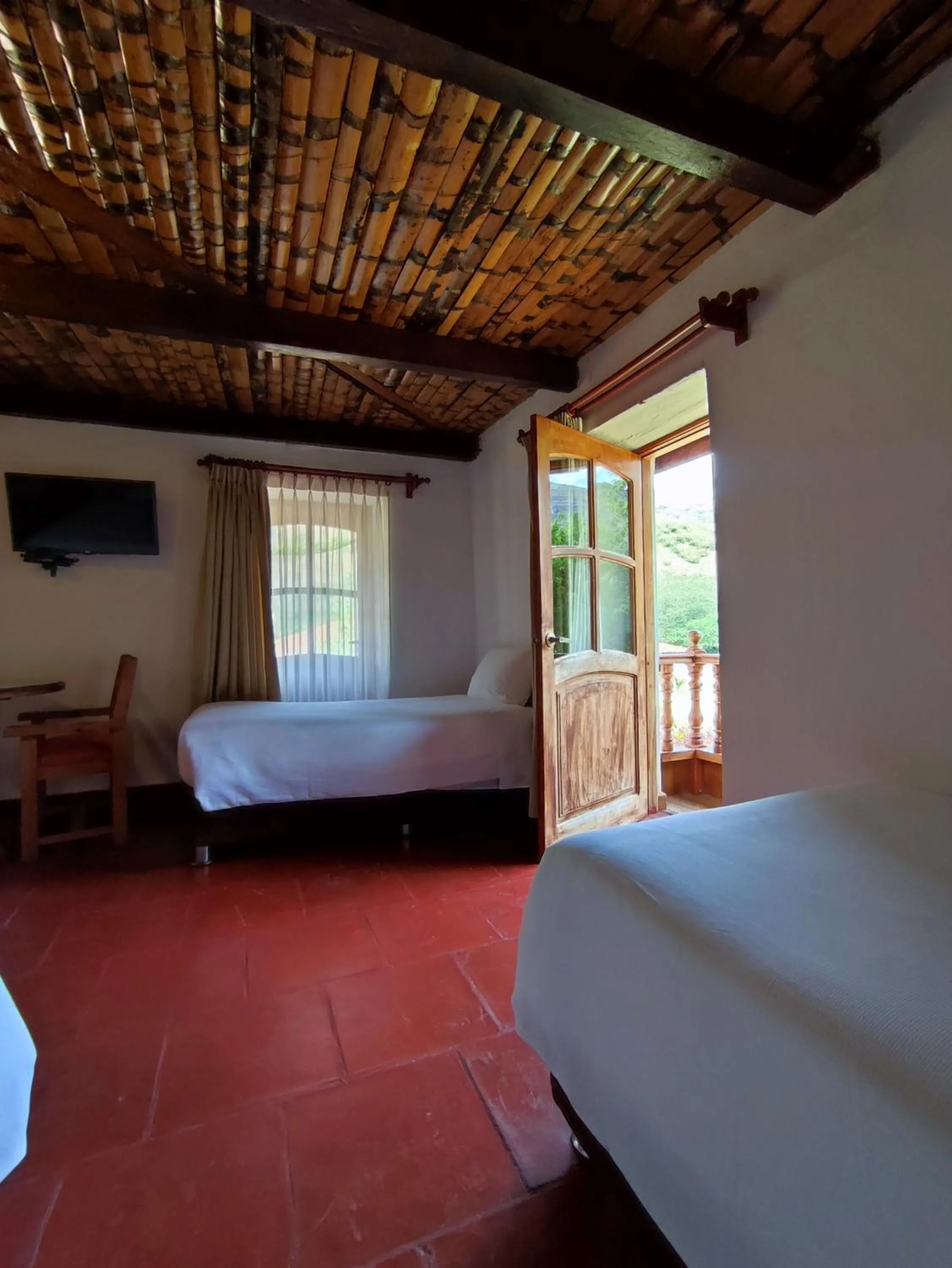 Bed in Hotel Fundo Achamaqui