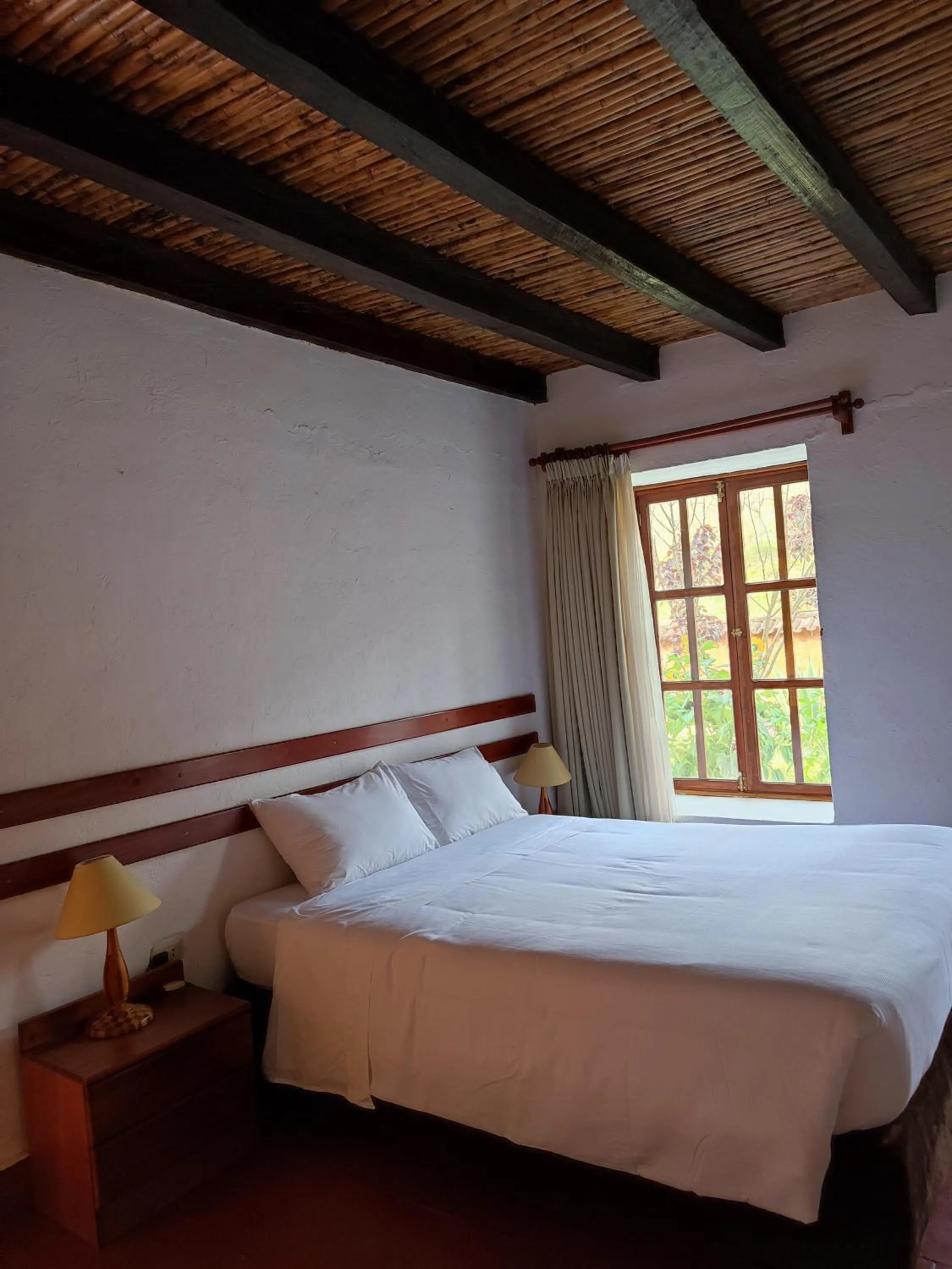 Bed in Hotel Fundo Achamaqui