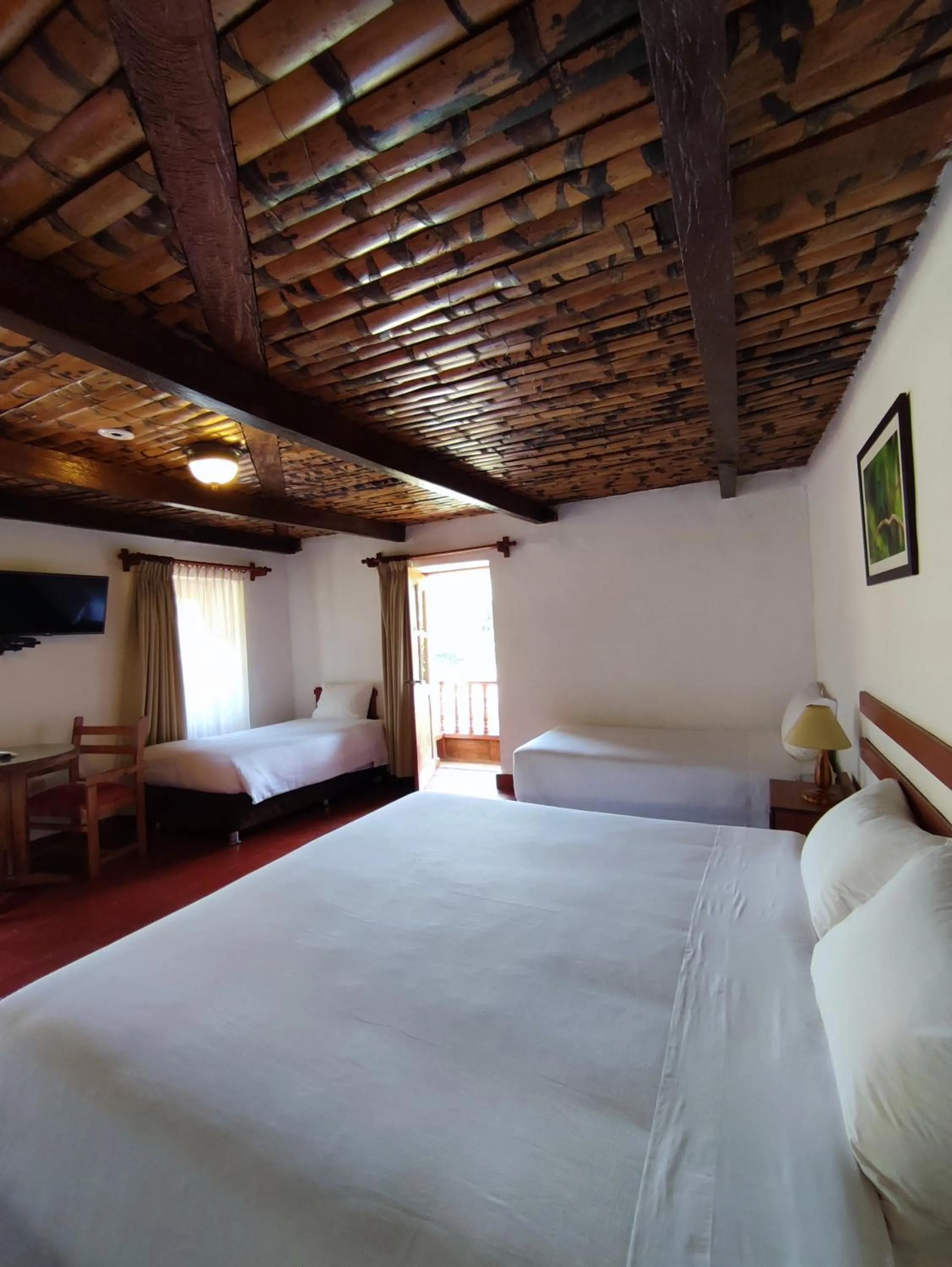 Bed in Hotel Fundo Achamaqui