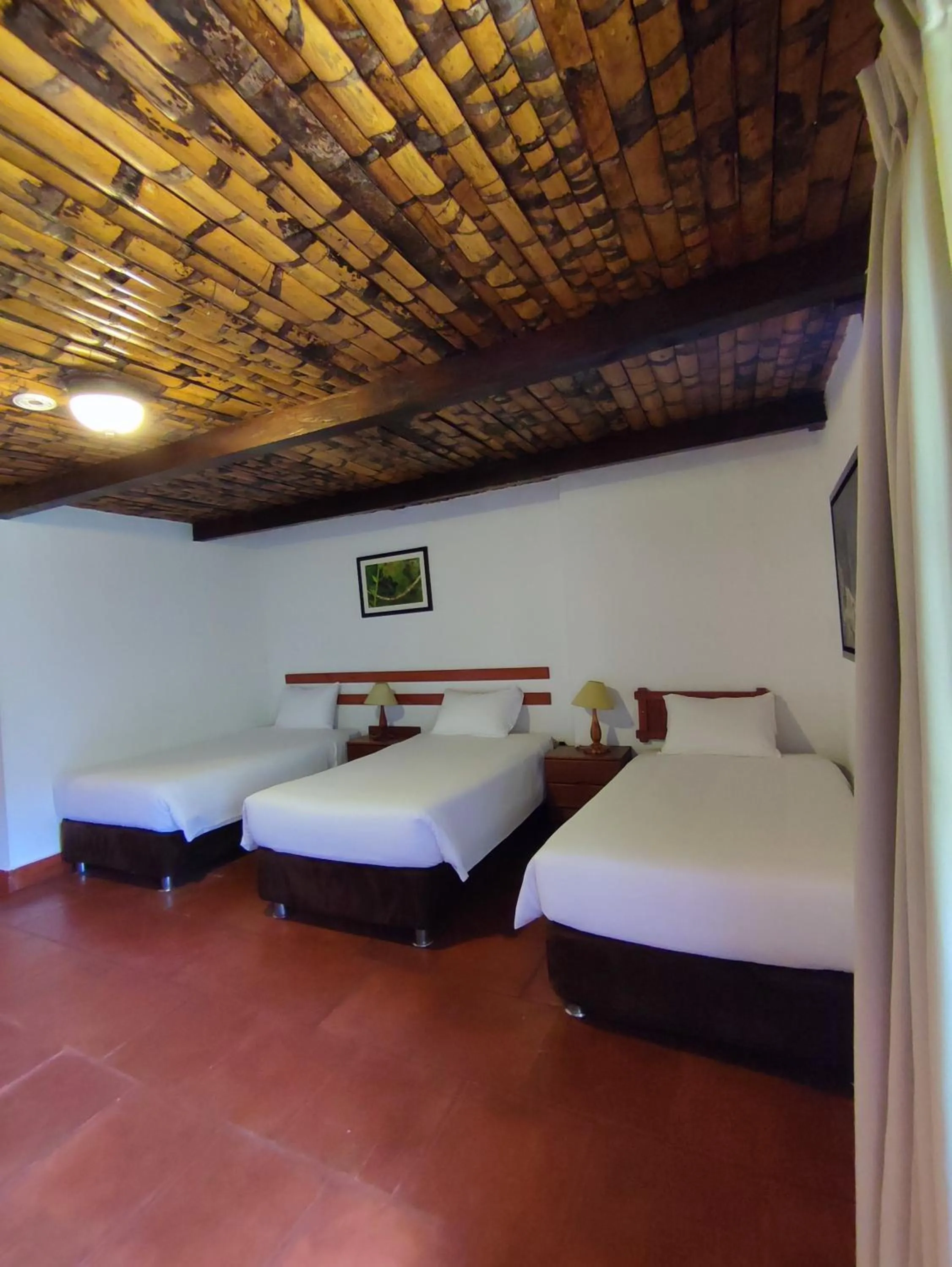 Bed in Hotel Fundo Achamaqui