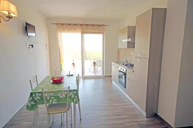 Communal lounge/ TV room in Villa Artemide