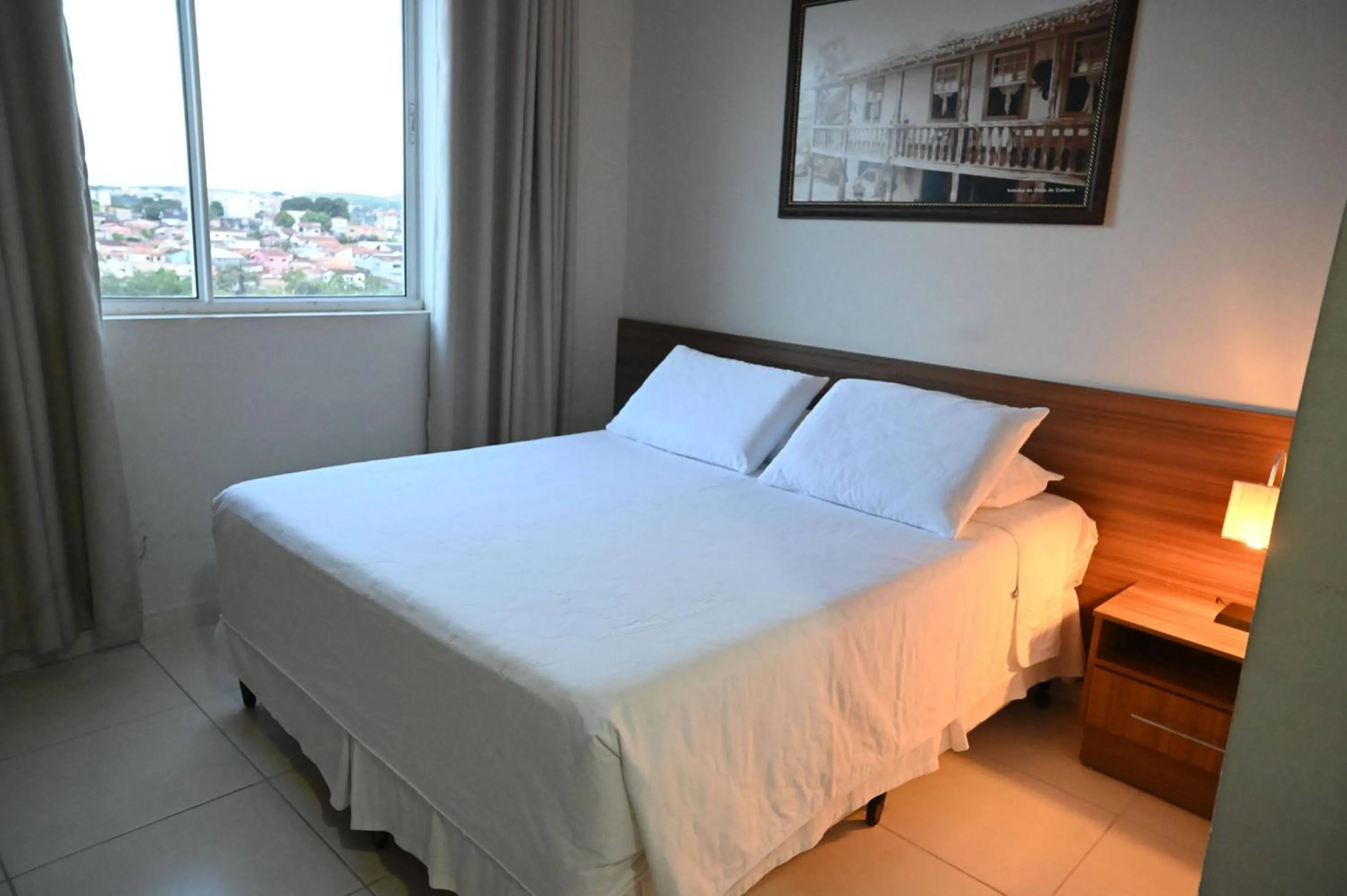 Bed in Paracatu Plaza Hotel