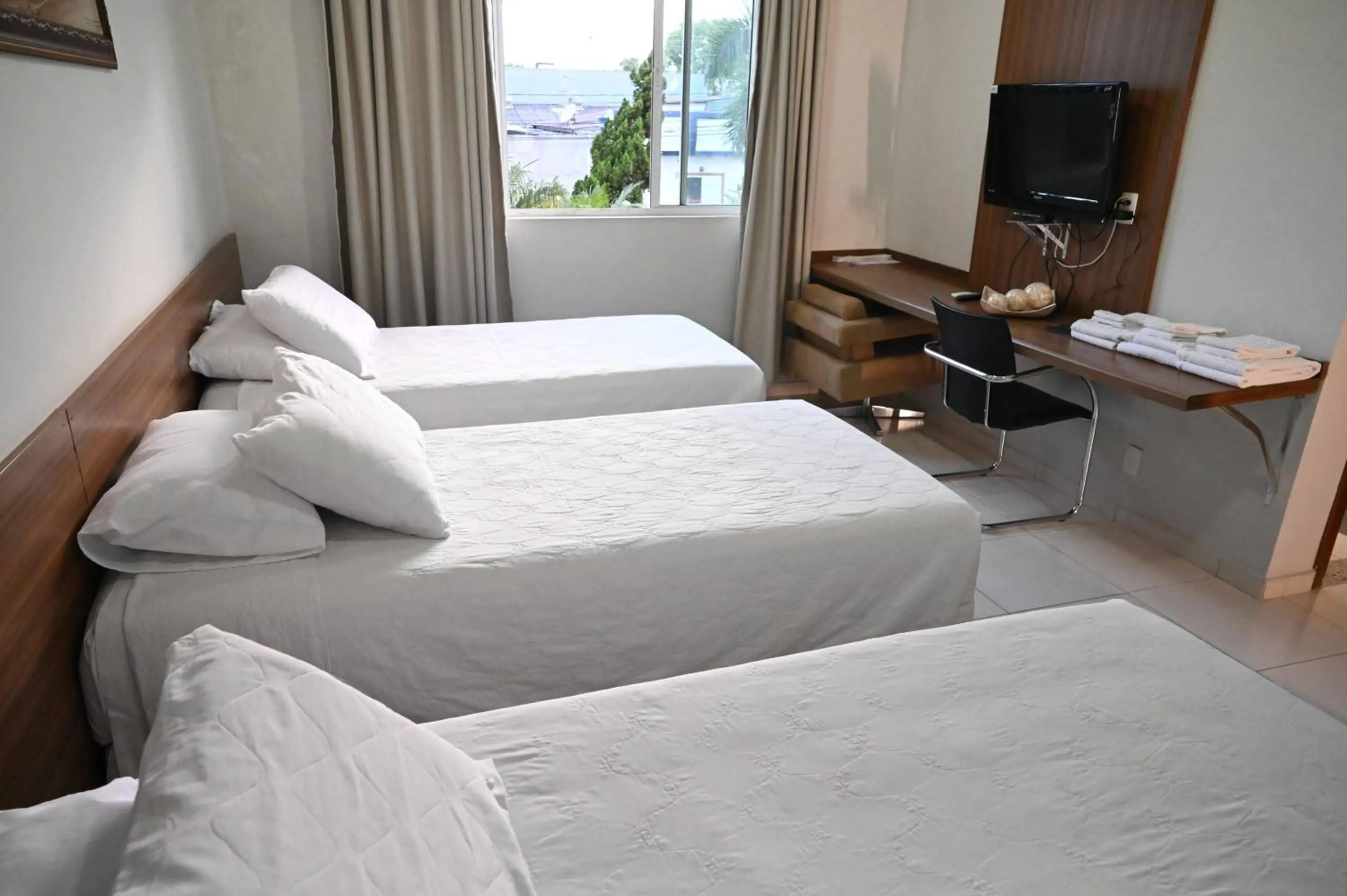 Bed in Paracatu Plaza Hotel