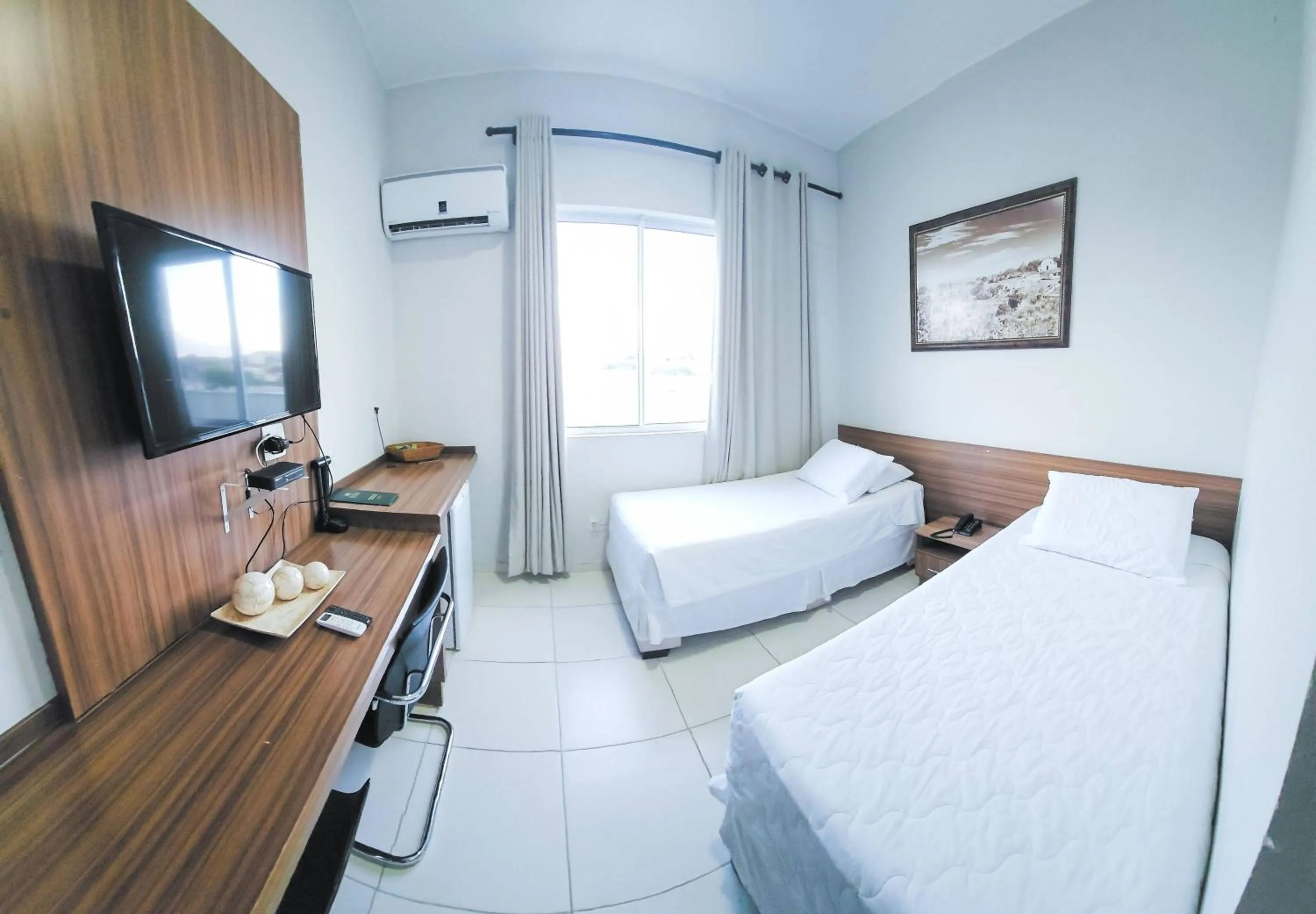 Bed in Paracatu Plaza Hotel