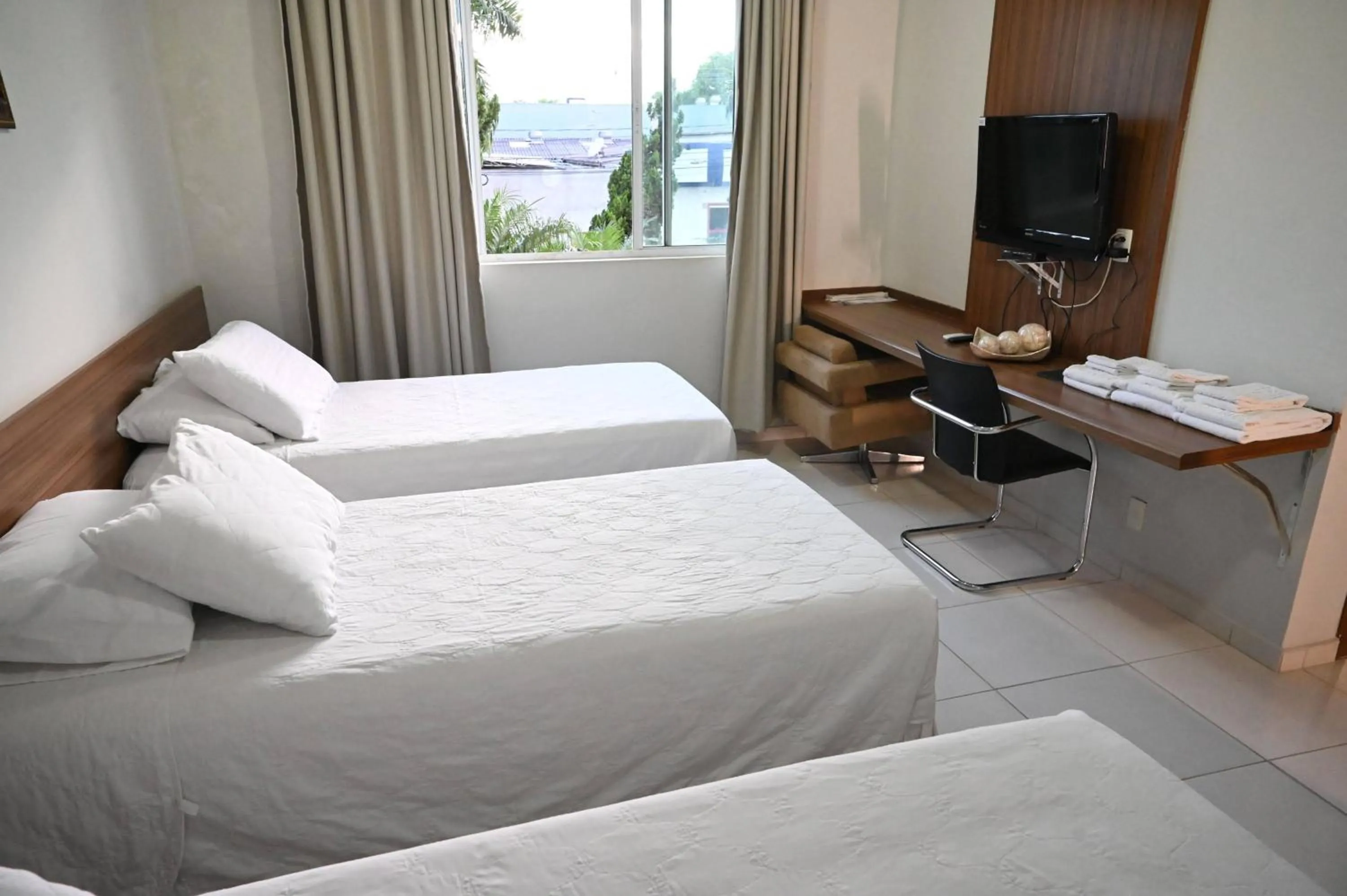 Bed in Paracatu Plaza Hotel