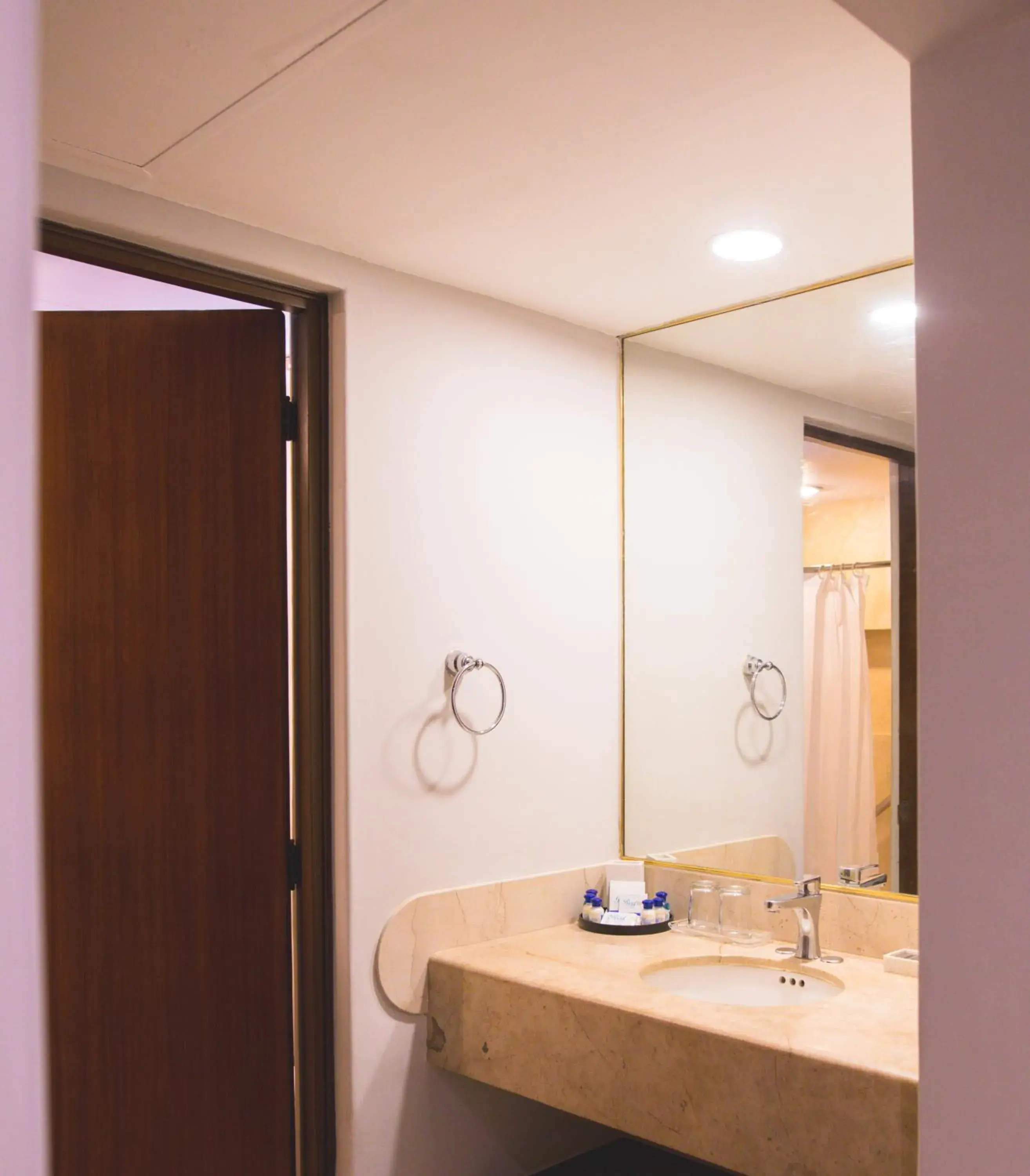 Bathroom in Reef Yucatán All Inclusive & Convention Center Bathroom in Reef Yucatán All Inclusive & Convention Center