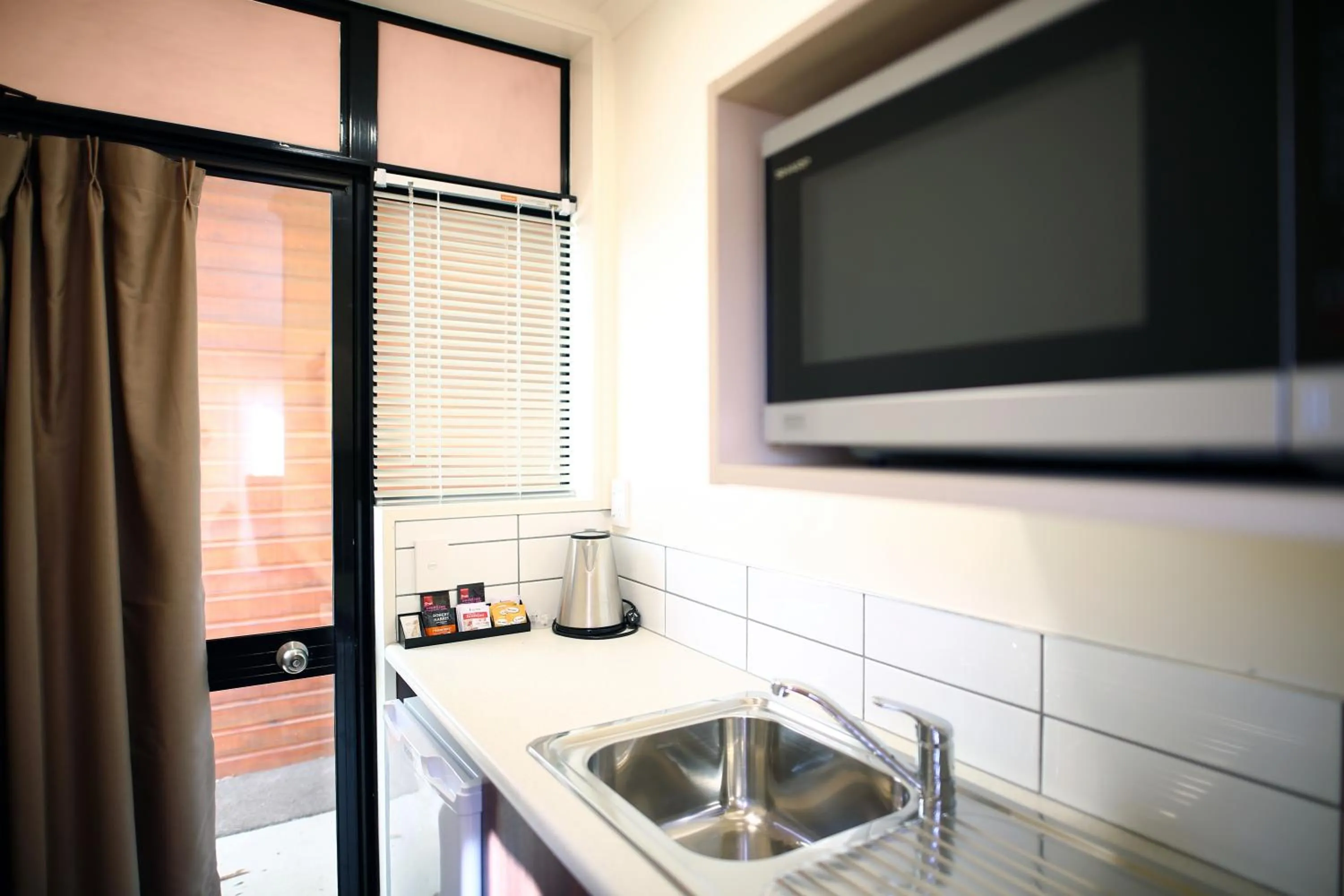Kitchen or kitchenette in Heritage Court Lodge Oamaru
