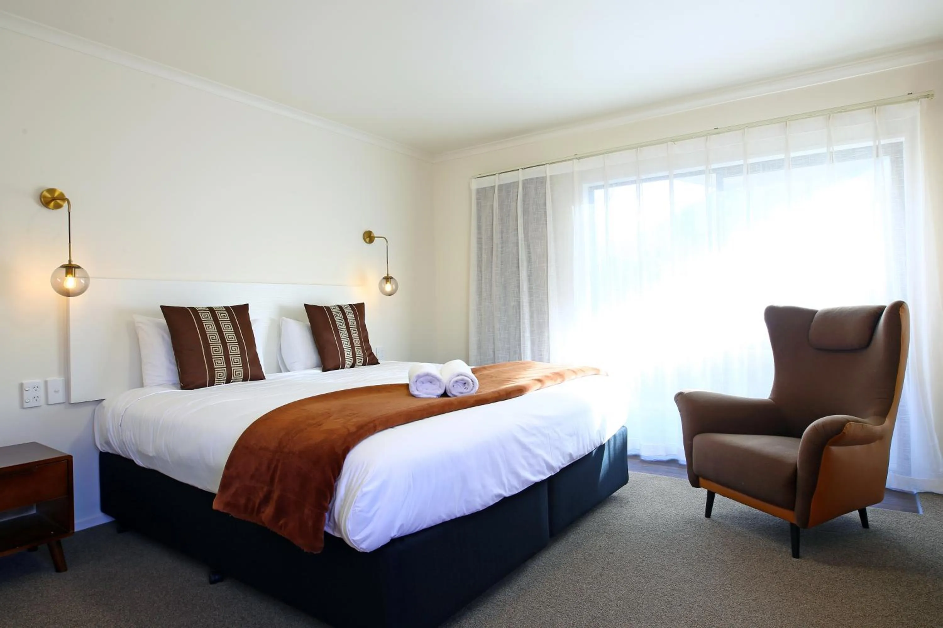 Bed in Heritage Court Lodge Oamaru