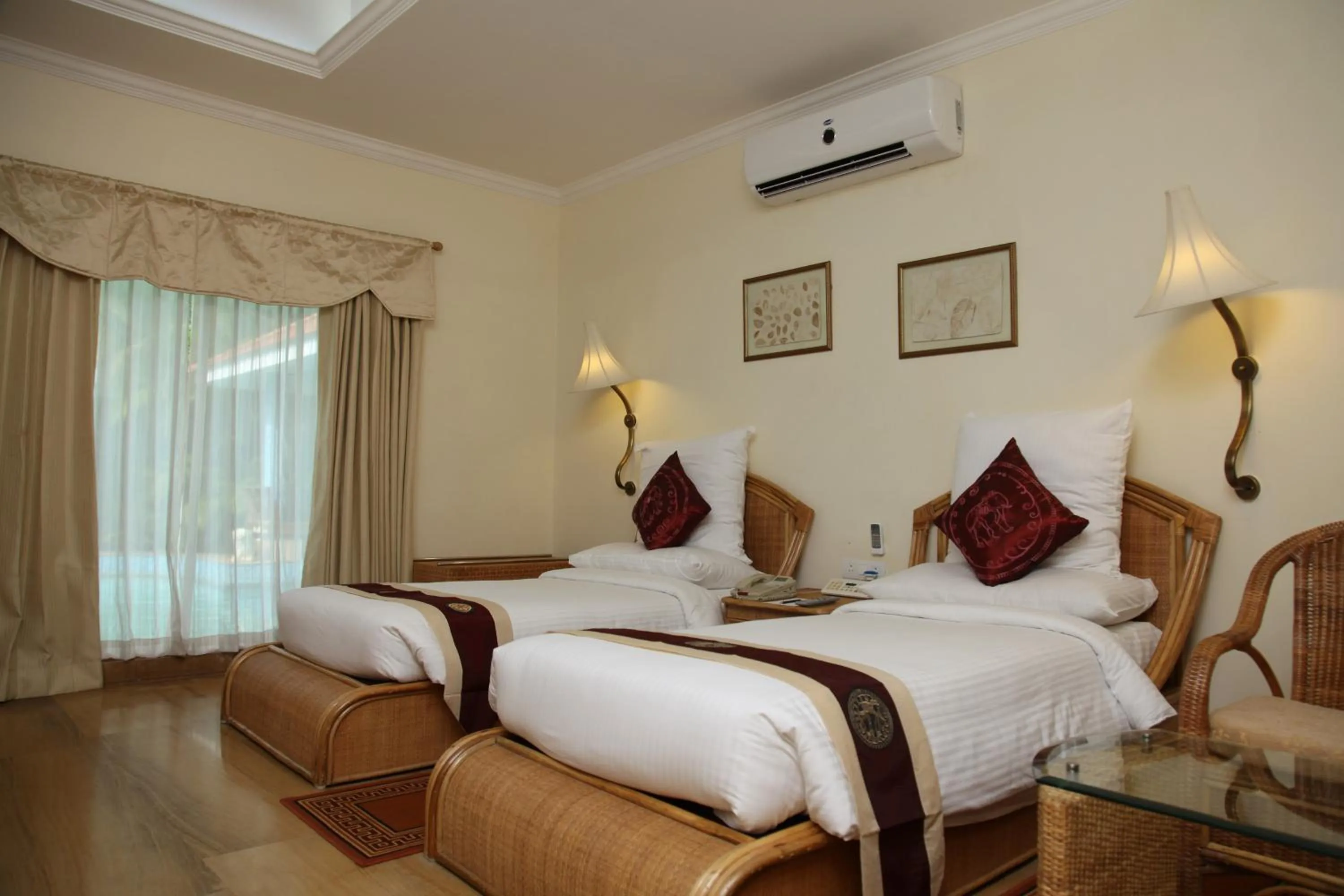 Bedroom, Bed in SAJ Earth Resort & Convention Center , Kochi