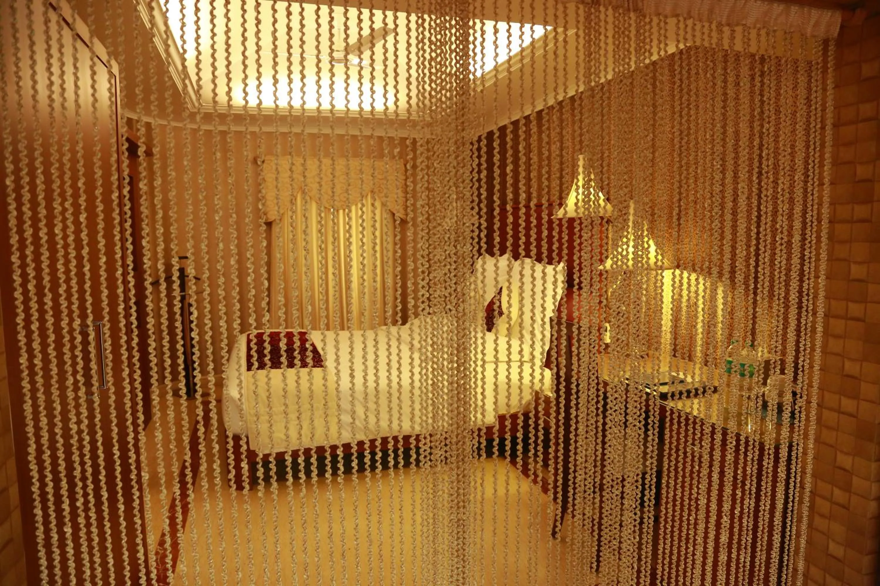 Bedroom, Bed in SAJ Earth Resort & Convention Center , Kochi