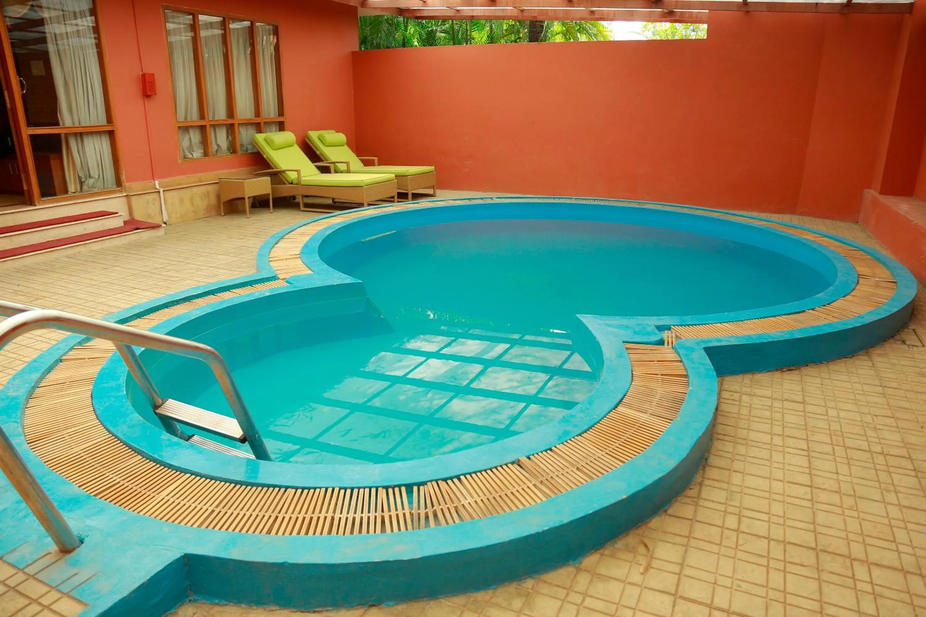 Swimming pool in SAJ Earth Resort & Convention Center , Kochi