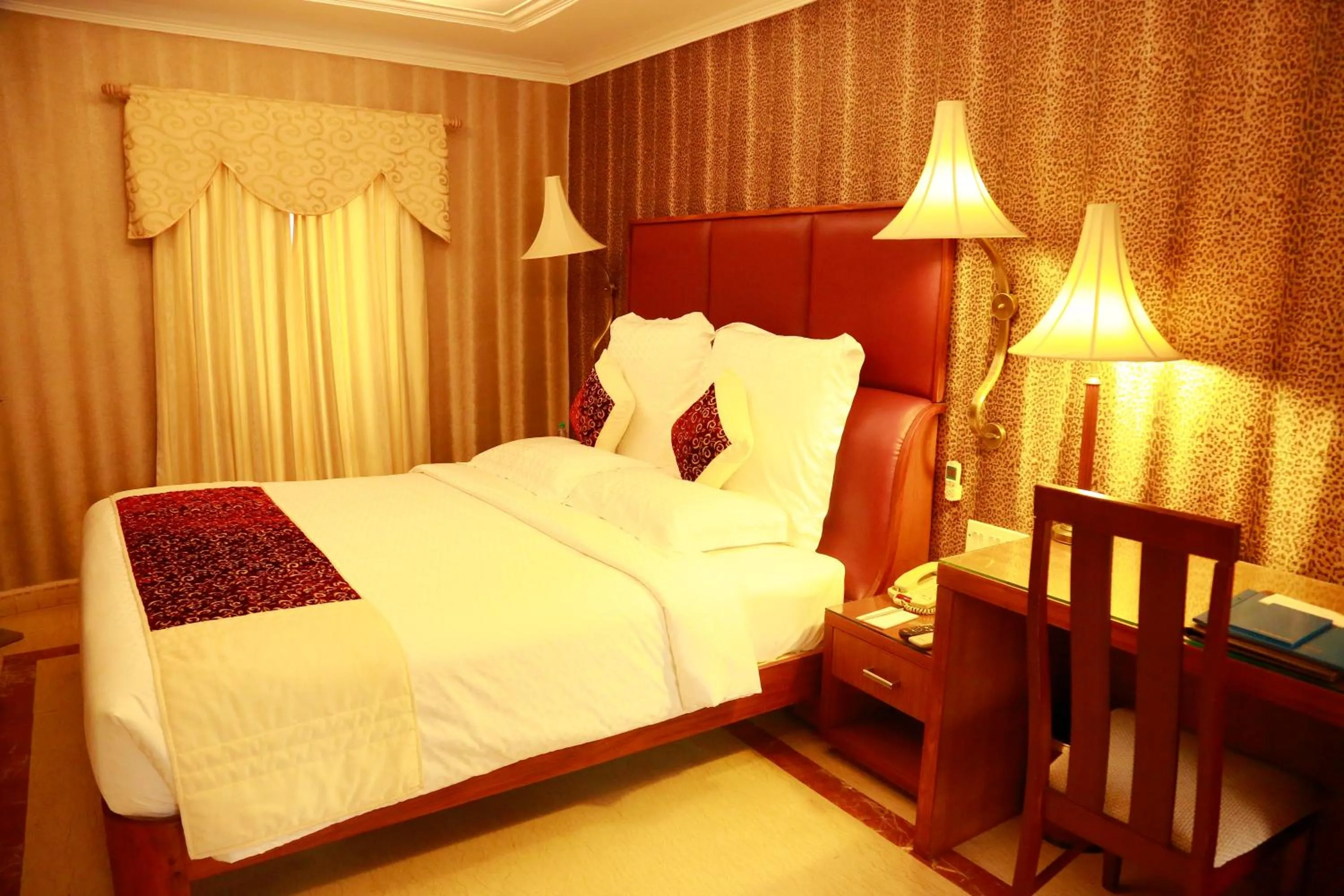 Bedroom, Bed in SAJ Earth Resort & Convention Center , Kochi