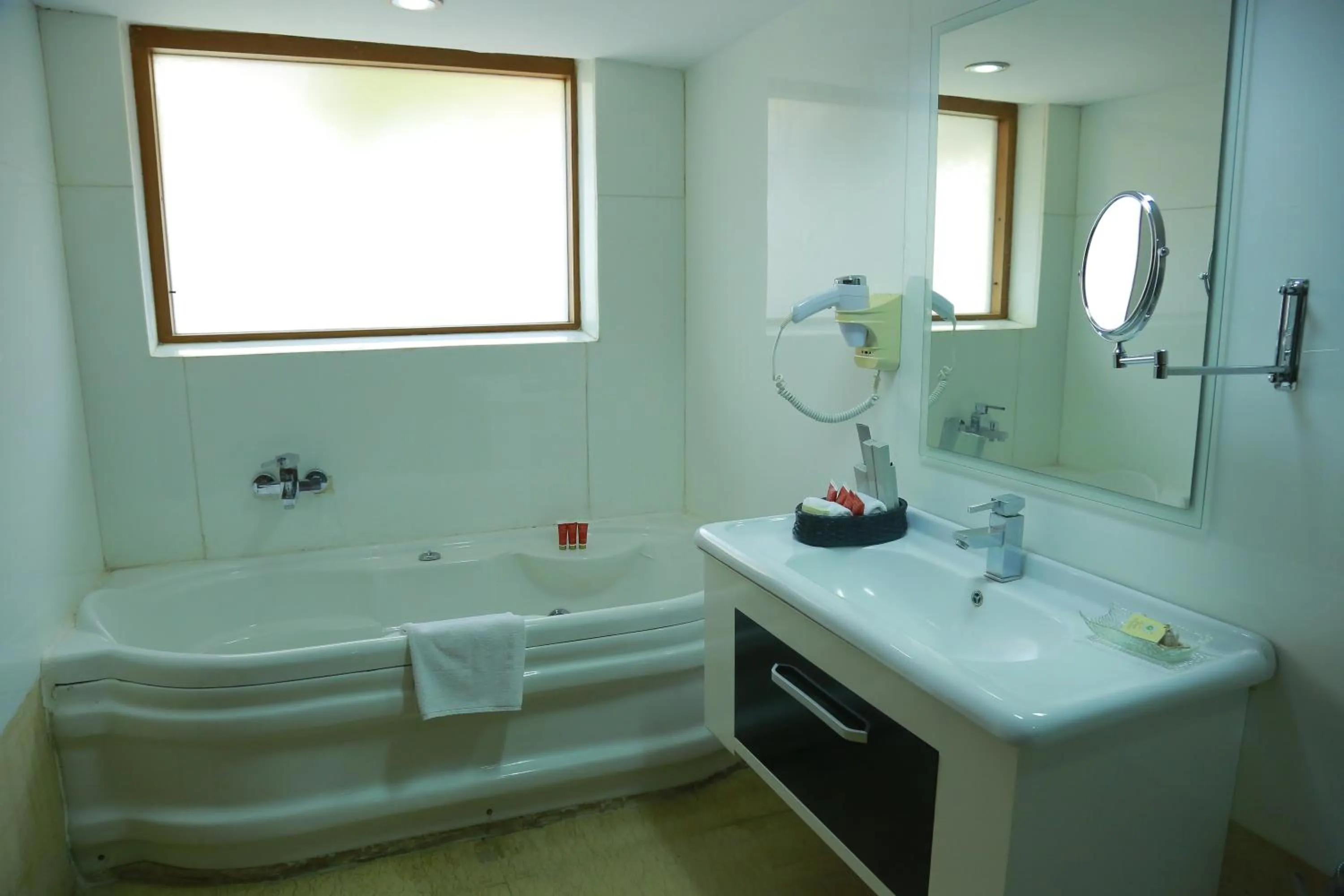 Bath in SAJ Earth Resort & Convention Center , Kochi