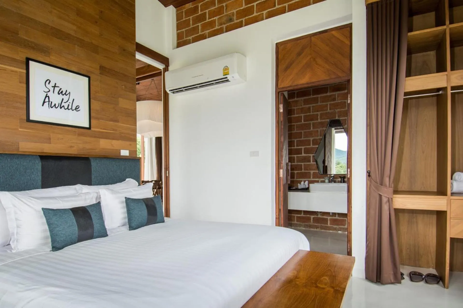 Bed in Puripai Villa