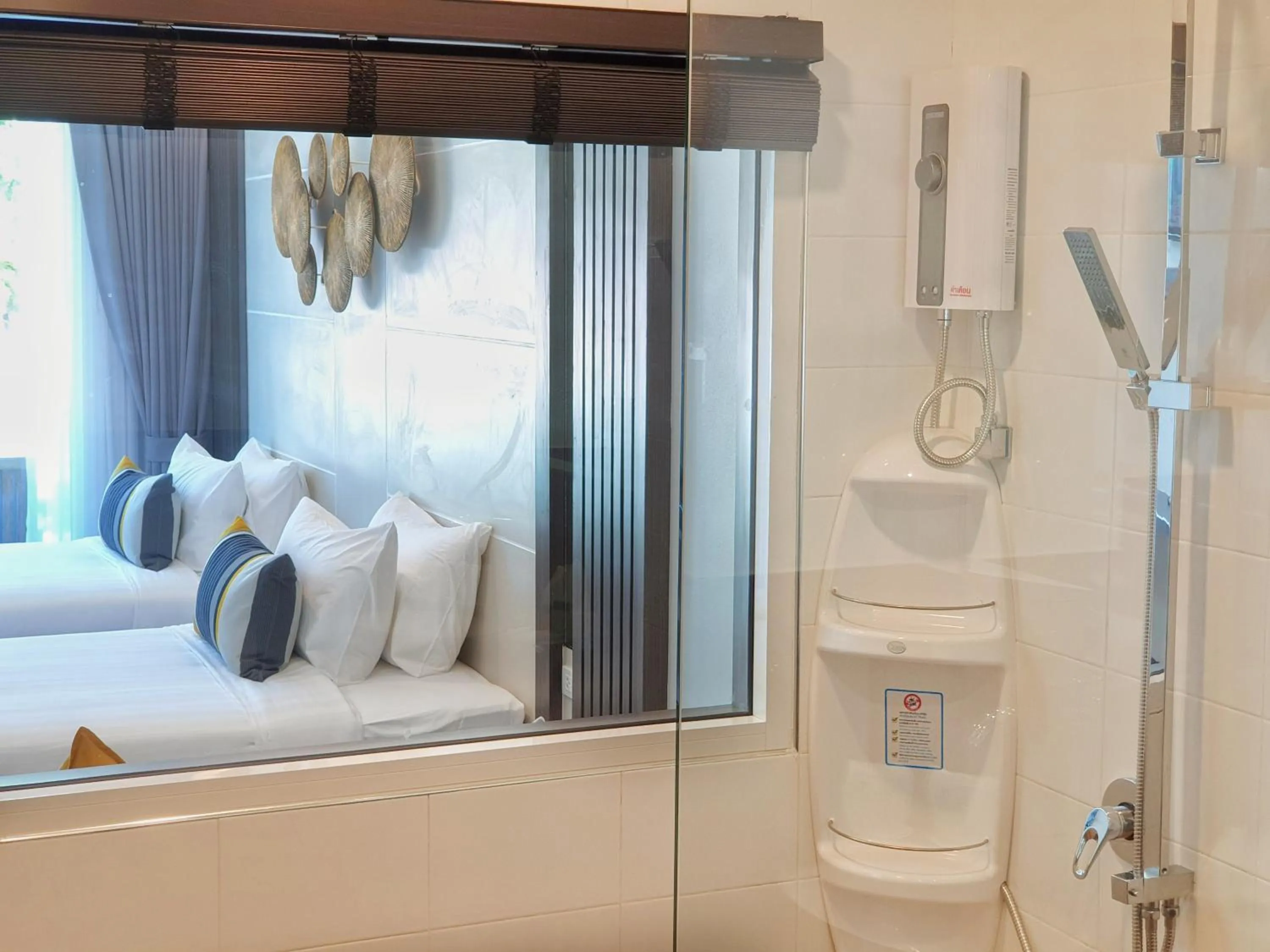 Bed in Chaolao Cabana Resort