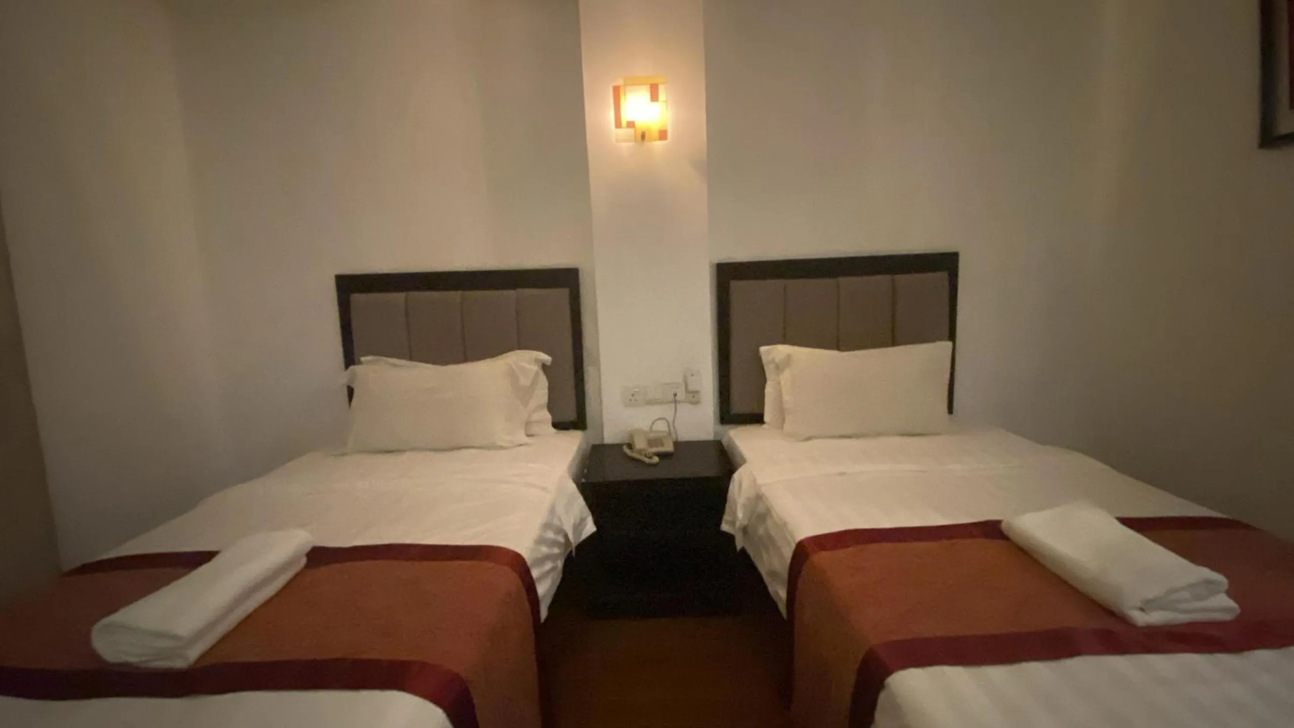 Bed in KK Waterfront Hotel