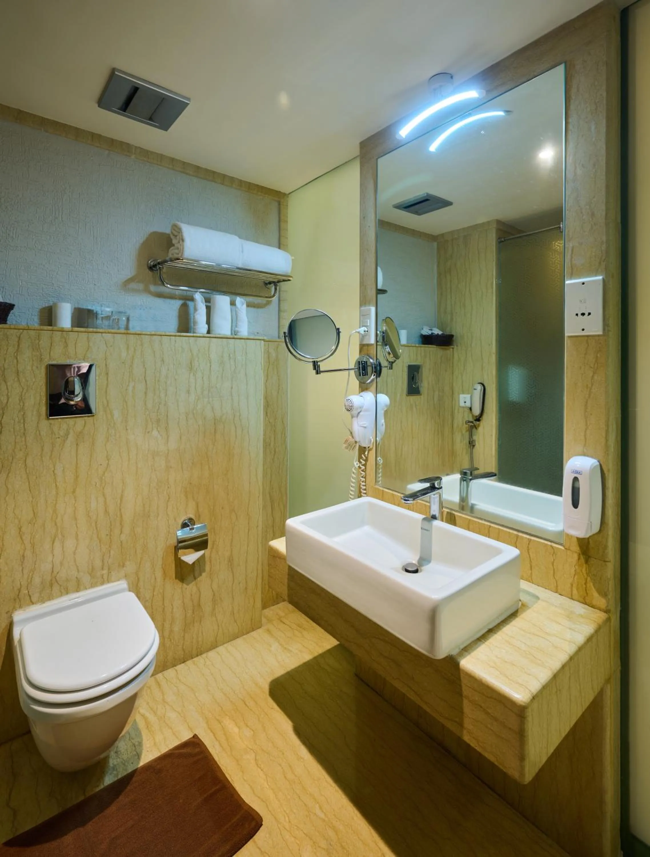 Shower in Flora Airport Hotel and Convention Centre Kochi