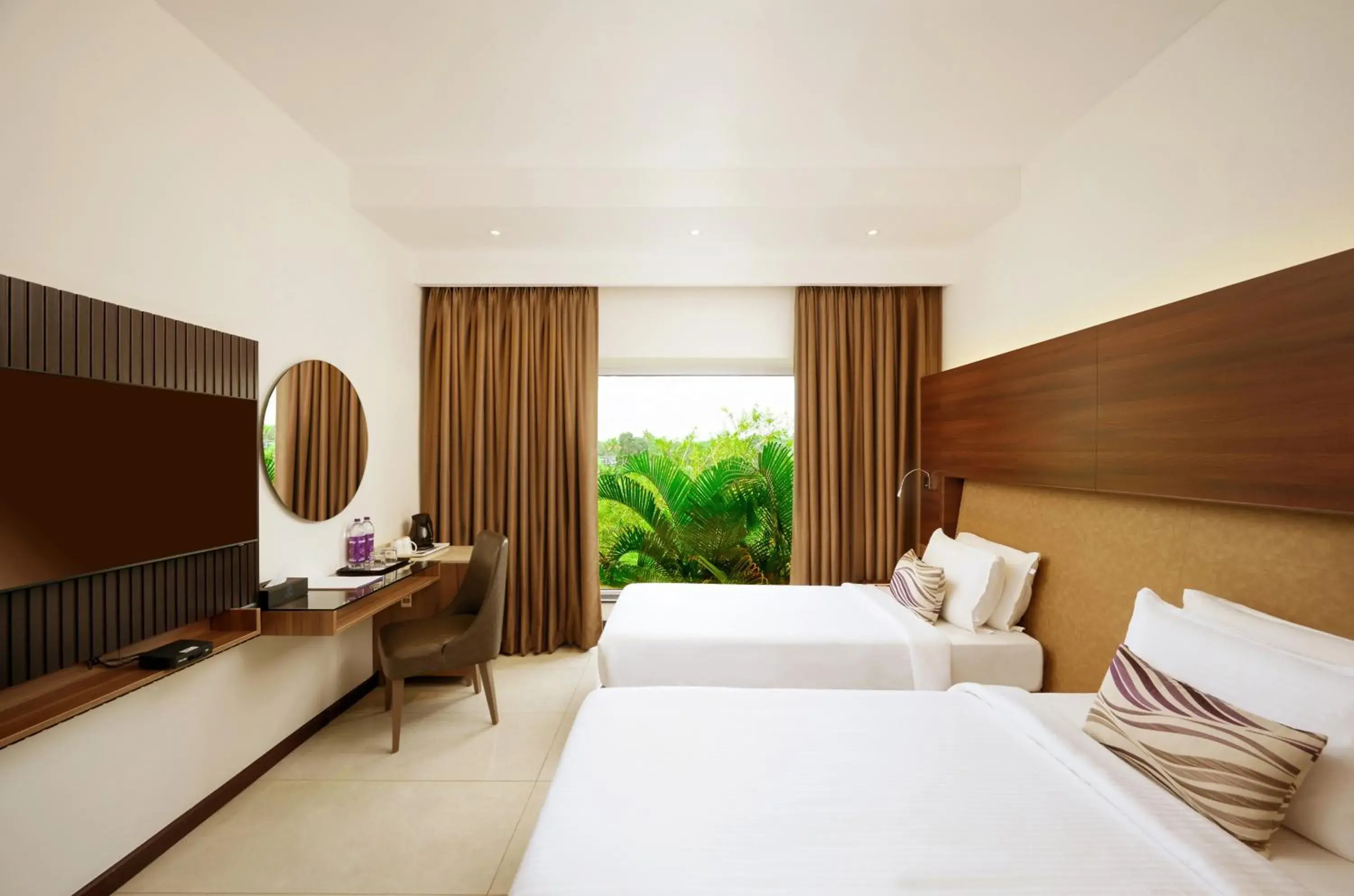 Deluxe twin room with complimentary airport transfers in Flora Airport Hotel and Convention Centre Kochi Deluxe twin room with complimentary airport transfers in Flora Airport Hotel and Convention Centre Kochi