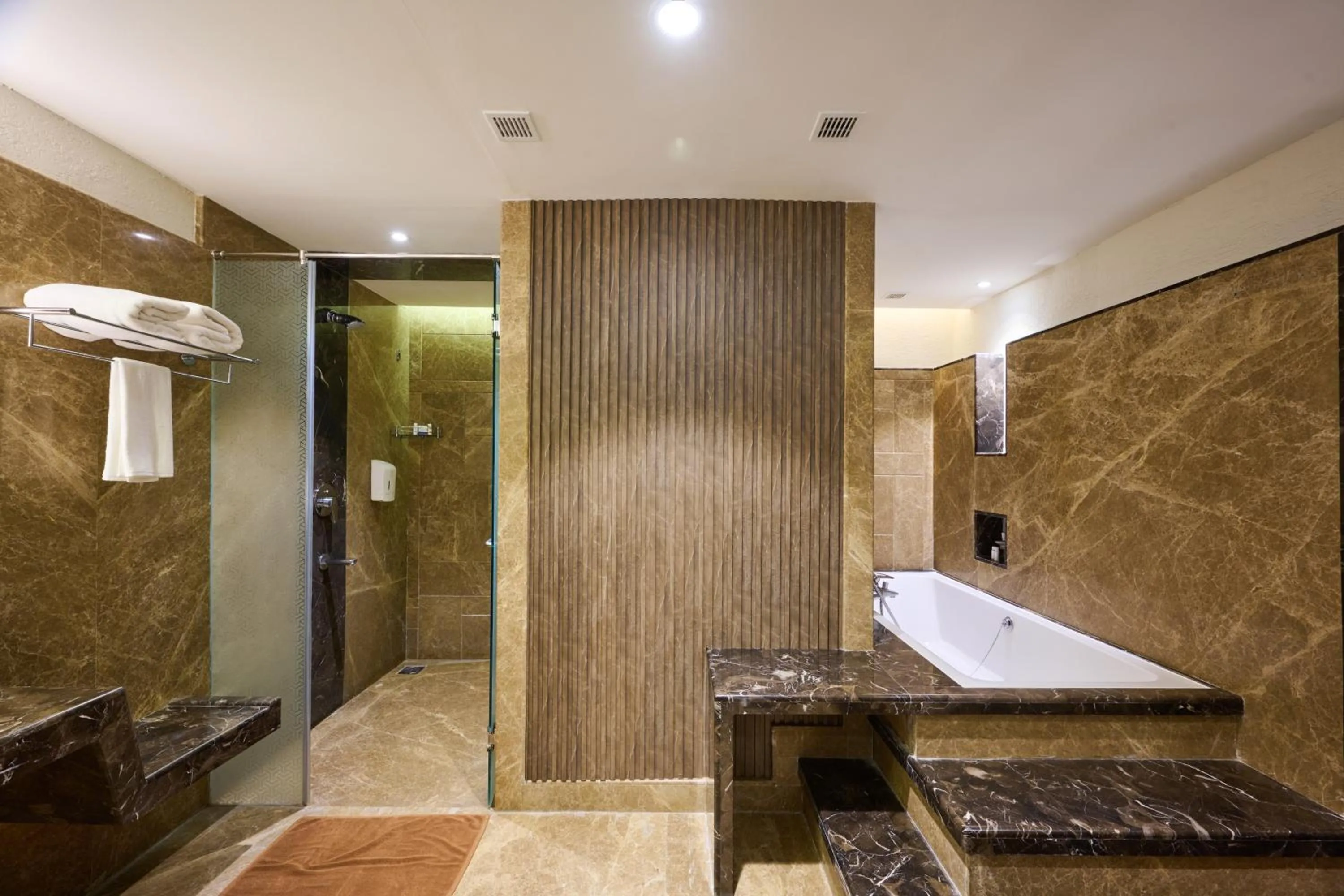 Shower in Flora Airport Hotel and Convention Centre Kochi