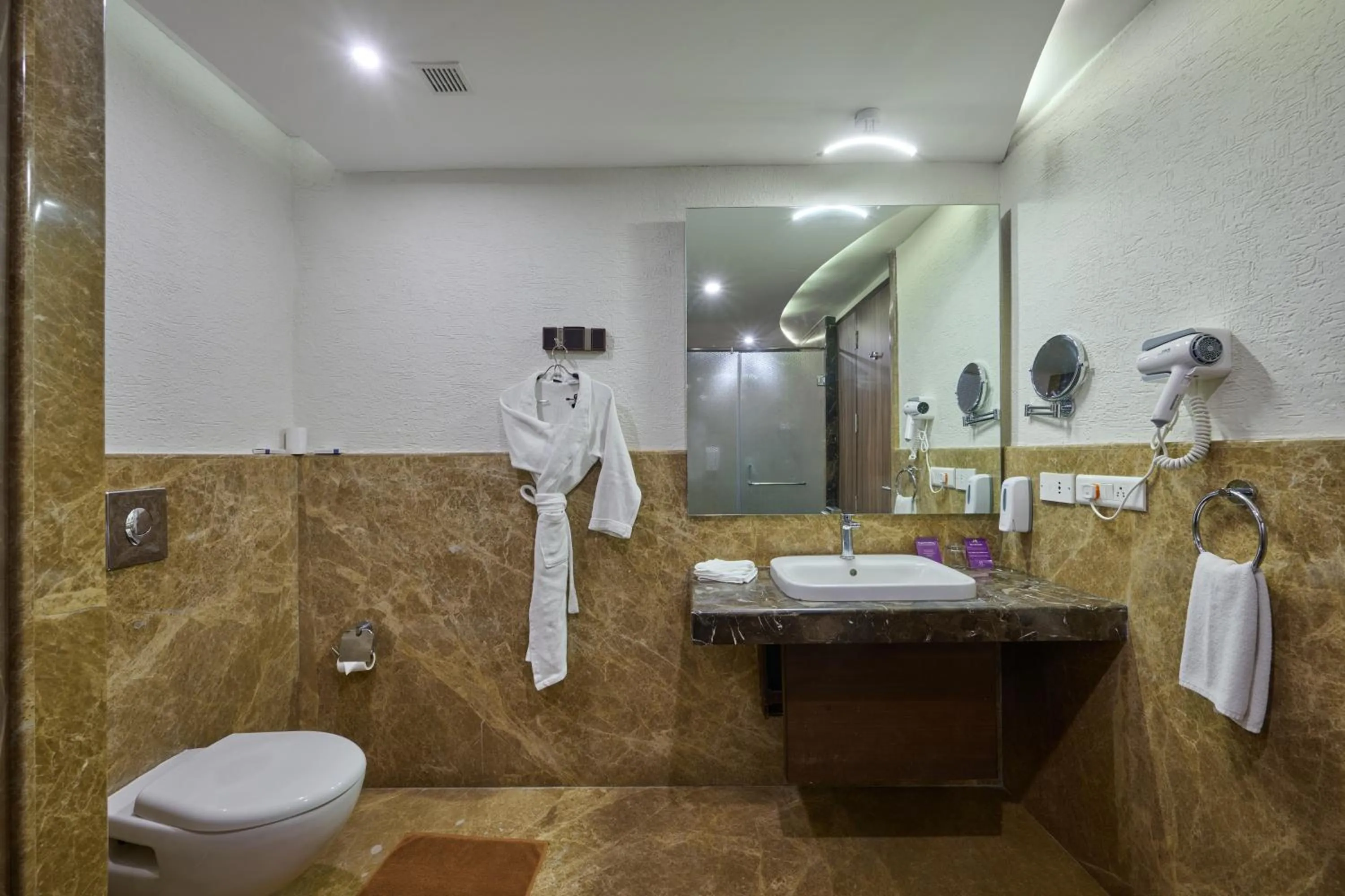 Toilet in Flora Airport Hotel and Convention Centre Kochi