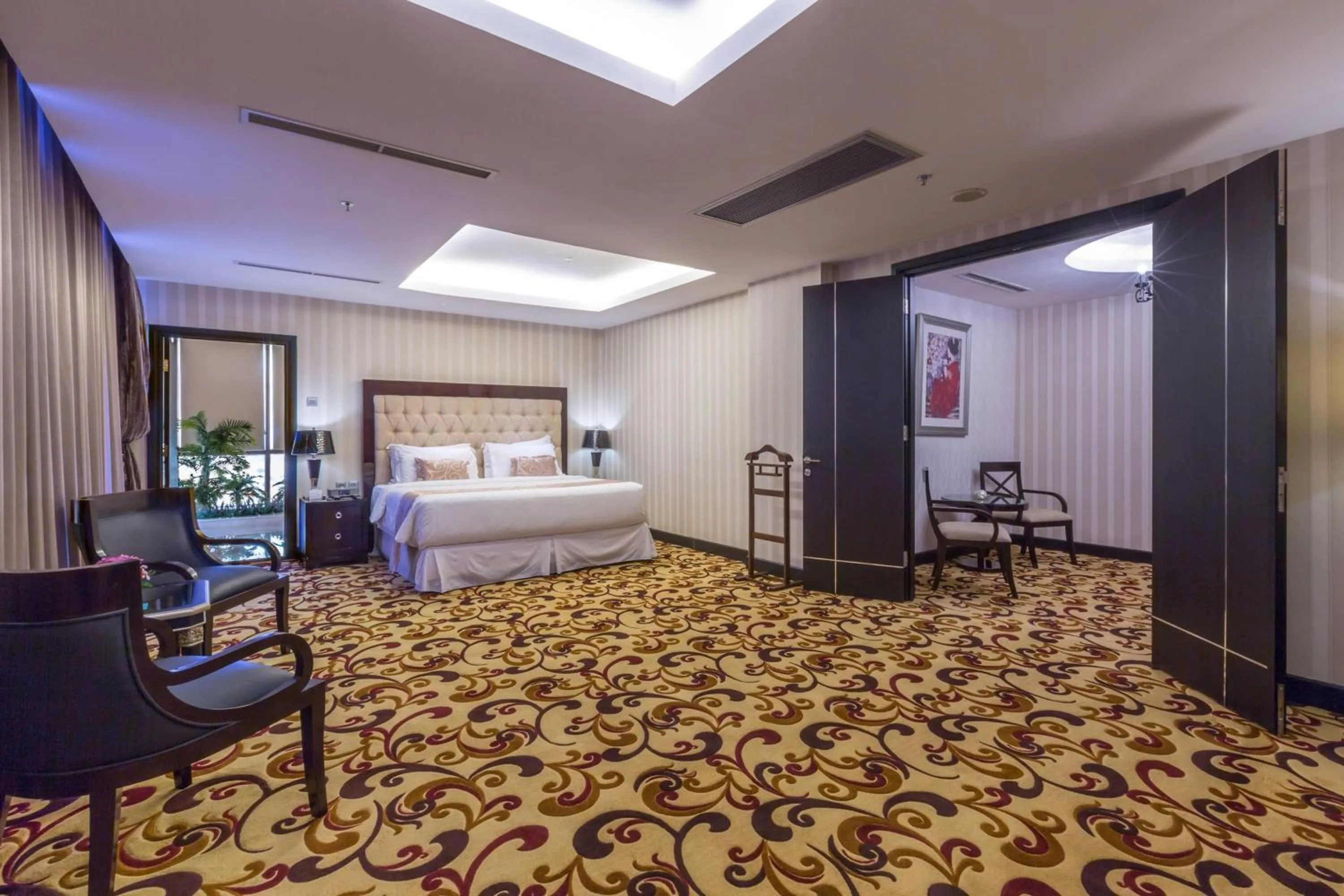 Photo of the whole room, Bed in Wyndham Surabaya