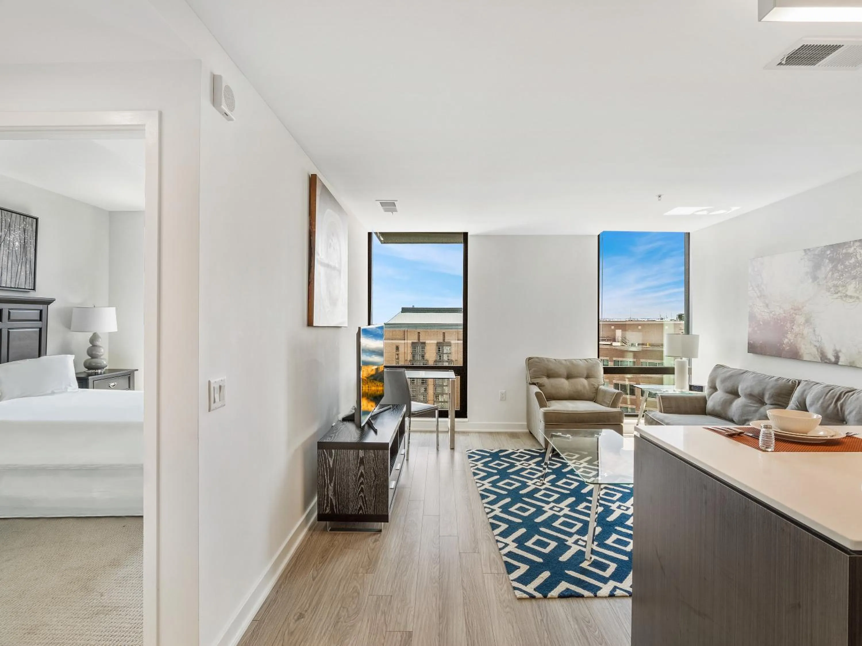 Living room, Bed in Global Luxury Suites at Reston Town Center