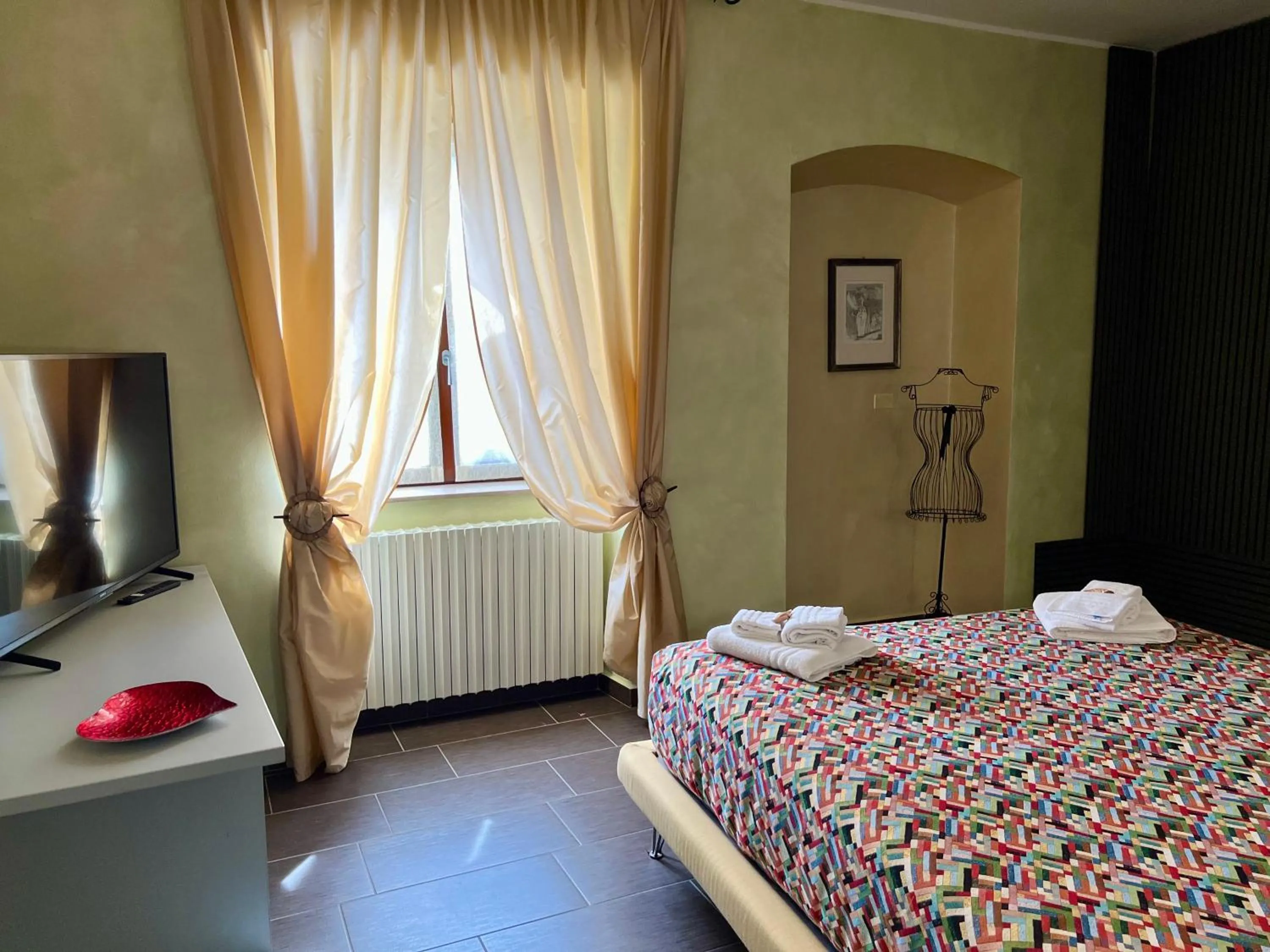 Photo of the whole room, Bed in Dimora del Riccio