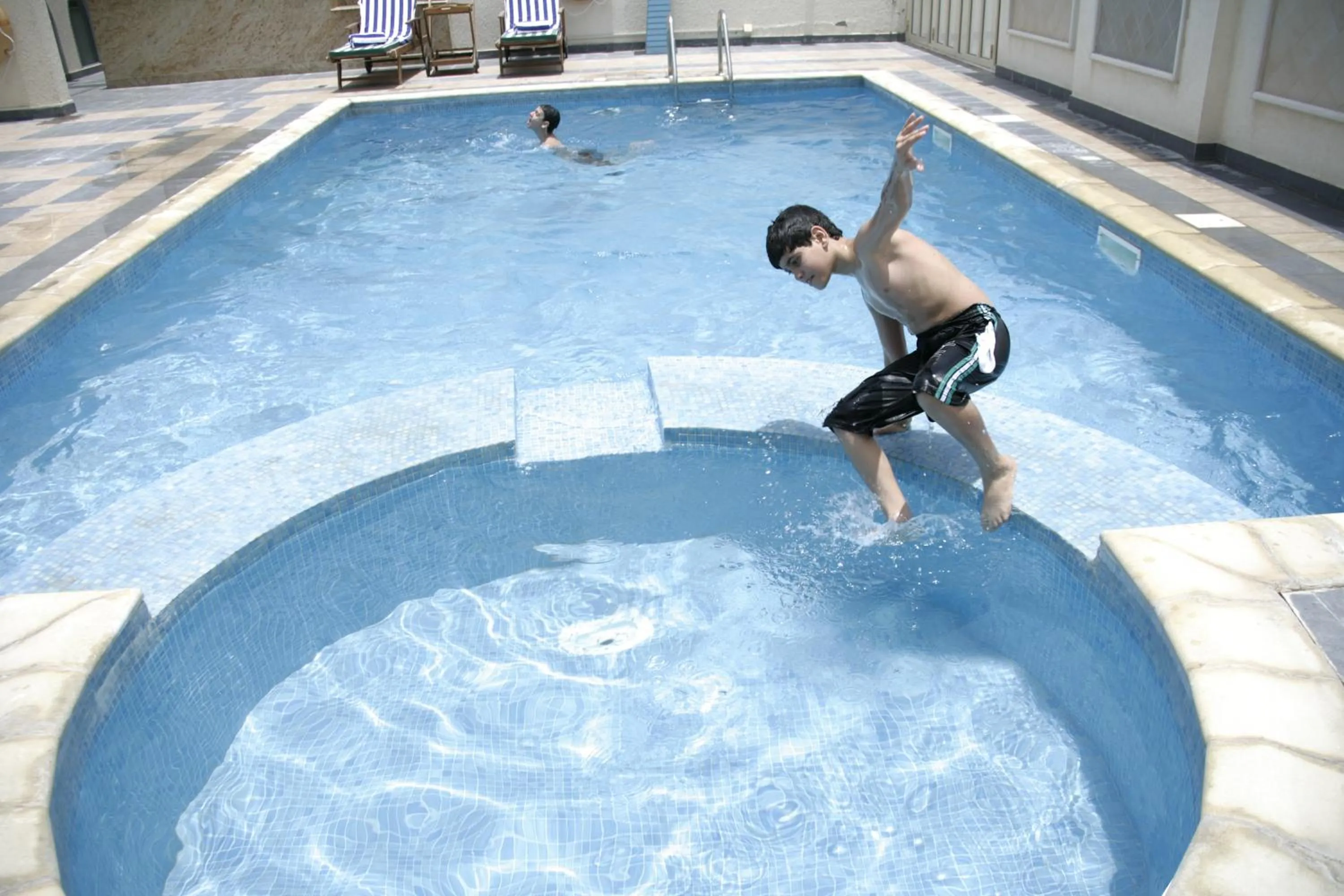 Swimming pool in Gokulam Park Doha