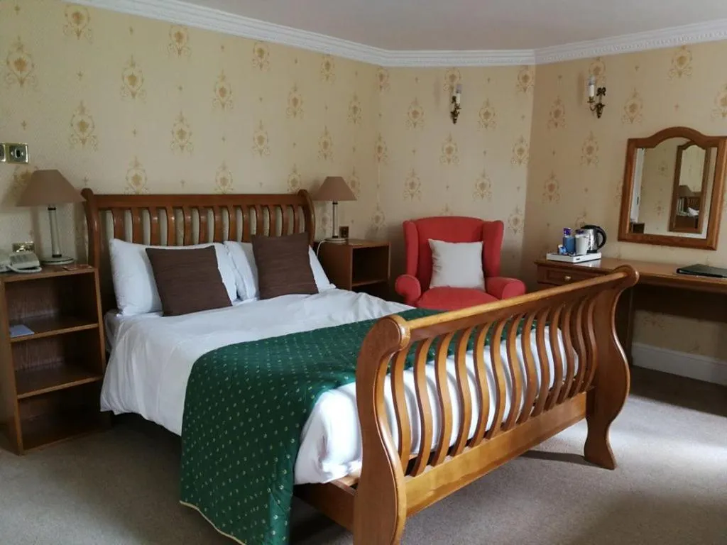 Bed in Chiseldon House Hotel