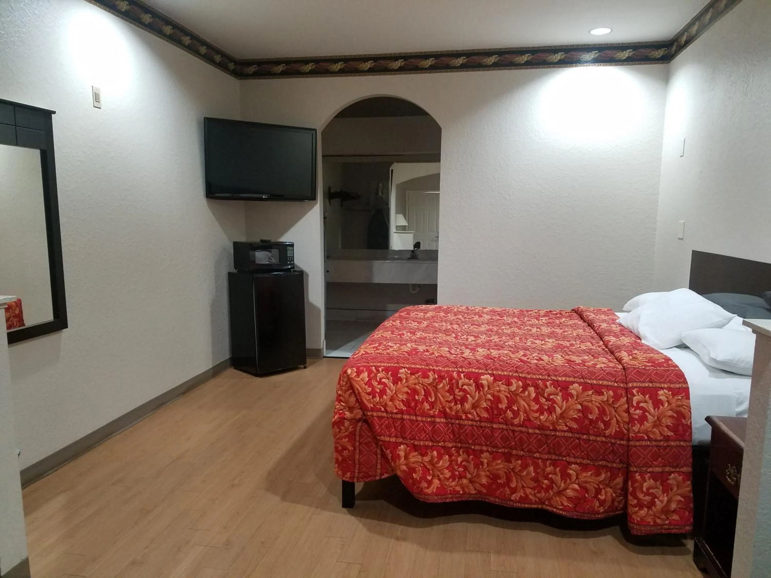 Bed in Scott Inn & Suites - Downtown Houston