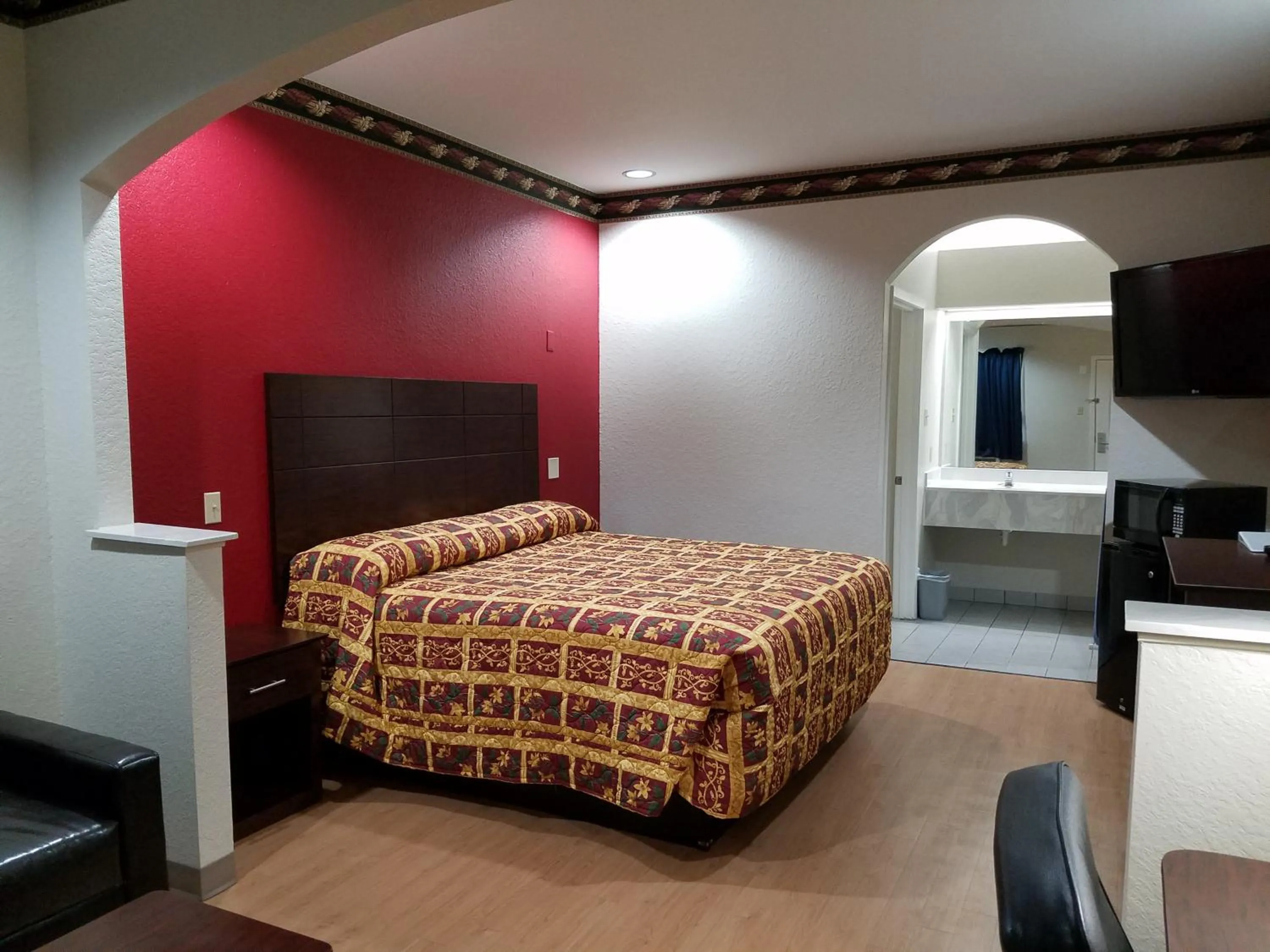 Bed in Scott Inn & Suites - Downtown Houston