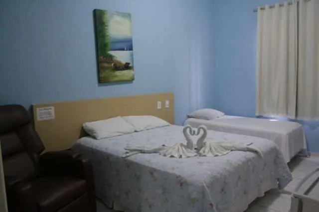 Bed in Jacarandá Palace Hotel