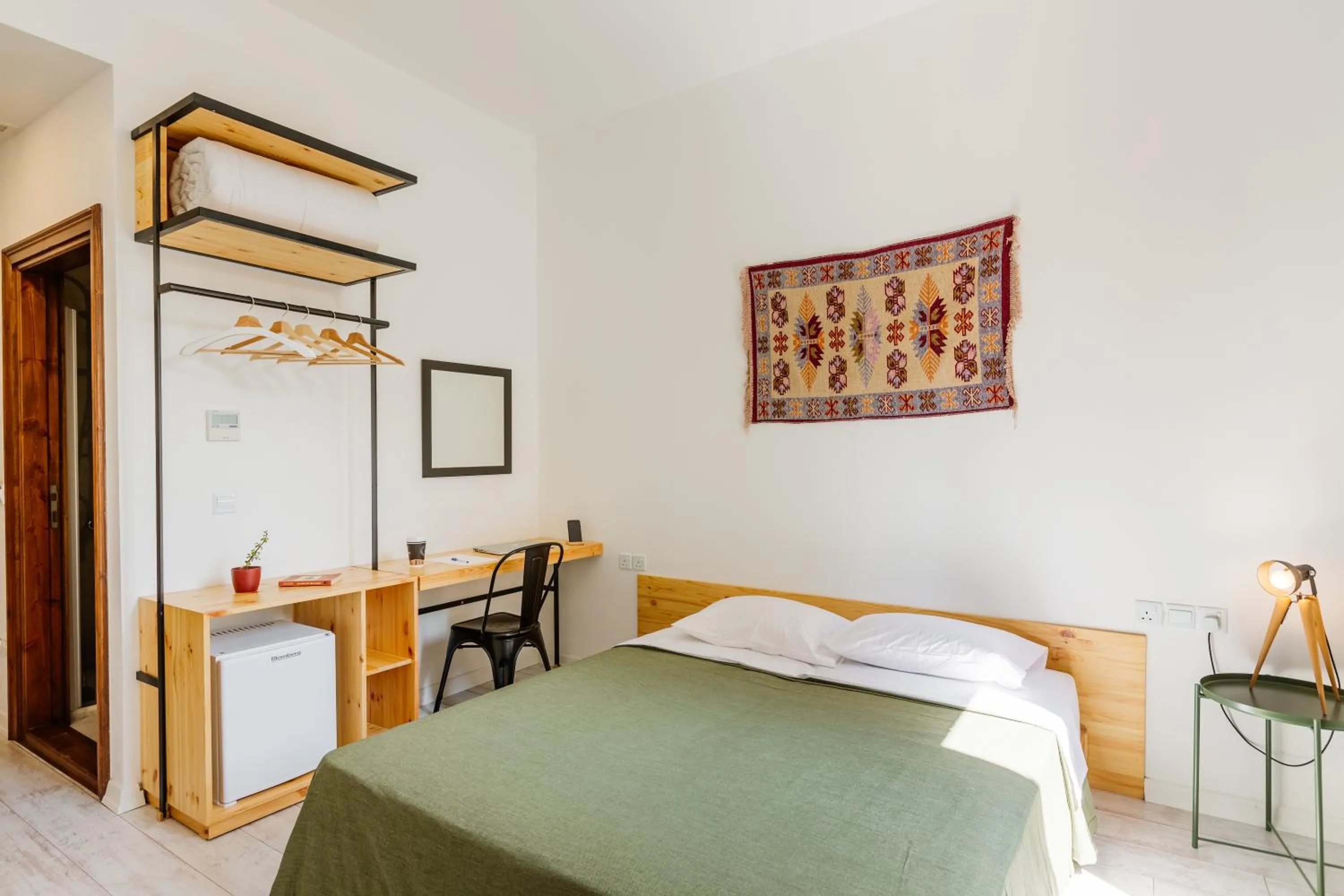 Photo of the whole room, Bed in Djumba Hotel & Cafe