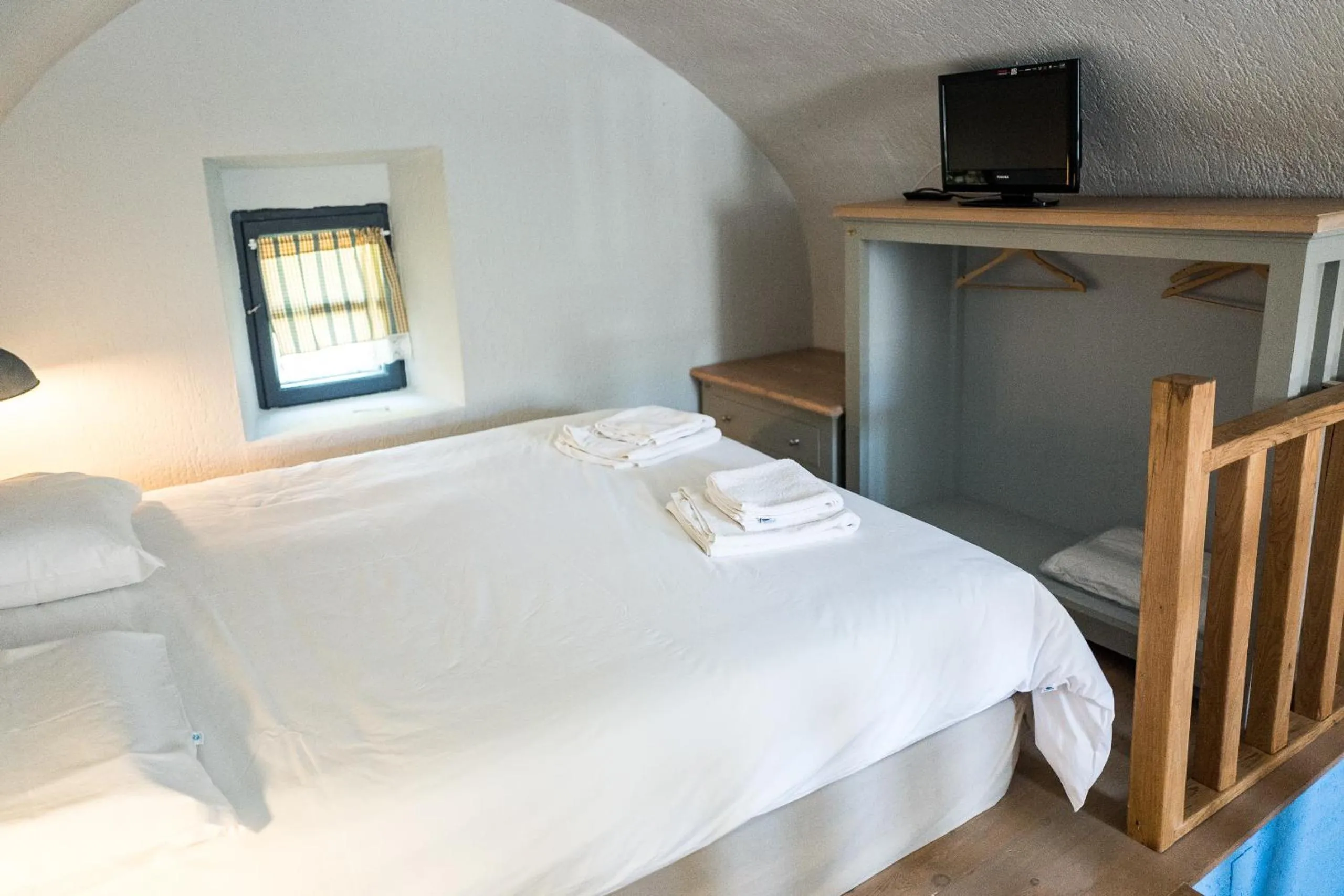 Bed in Avgonima Chios Spitakia Cottages