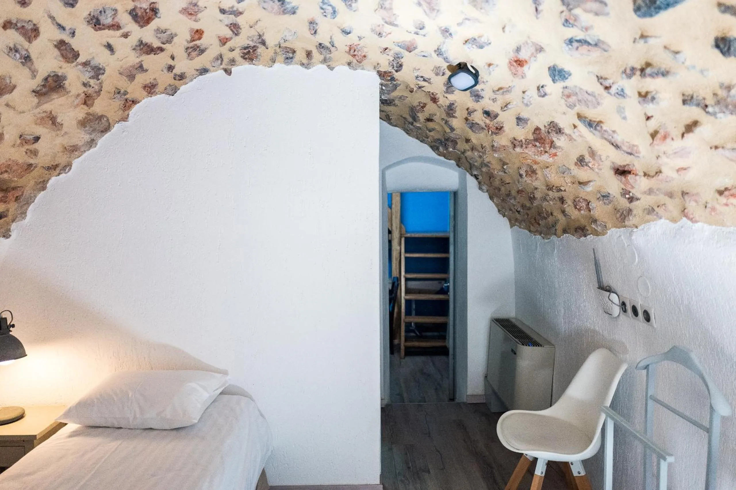 Bed in Avgonima Chios Spitakia Cottages
