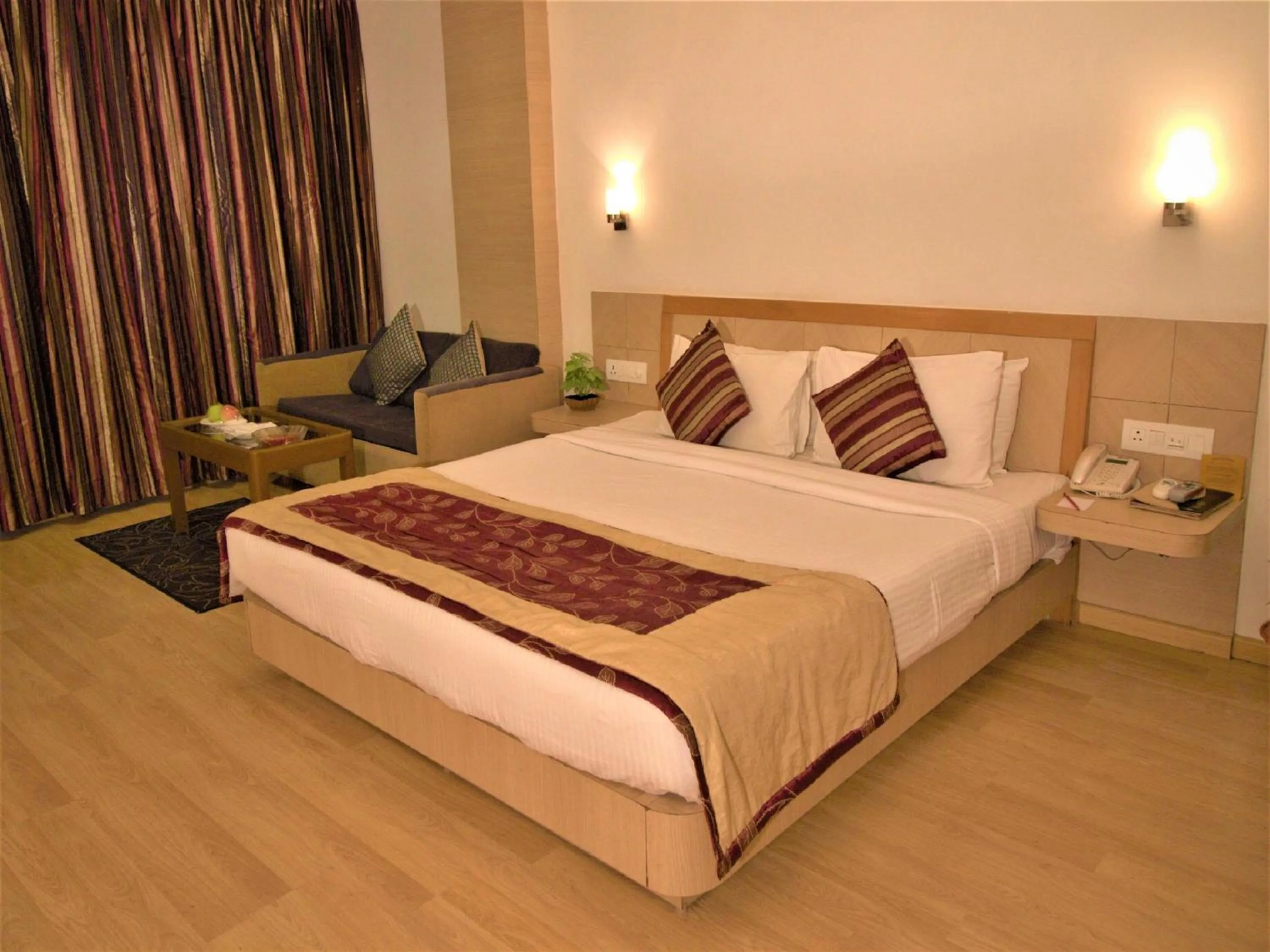 Photo of the whole room, Bed in IRA By Orchid Bhubaneswar