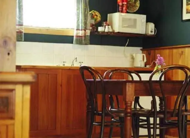 Kitchen or kitchenette in Red Brier Cottage Accommodation