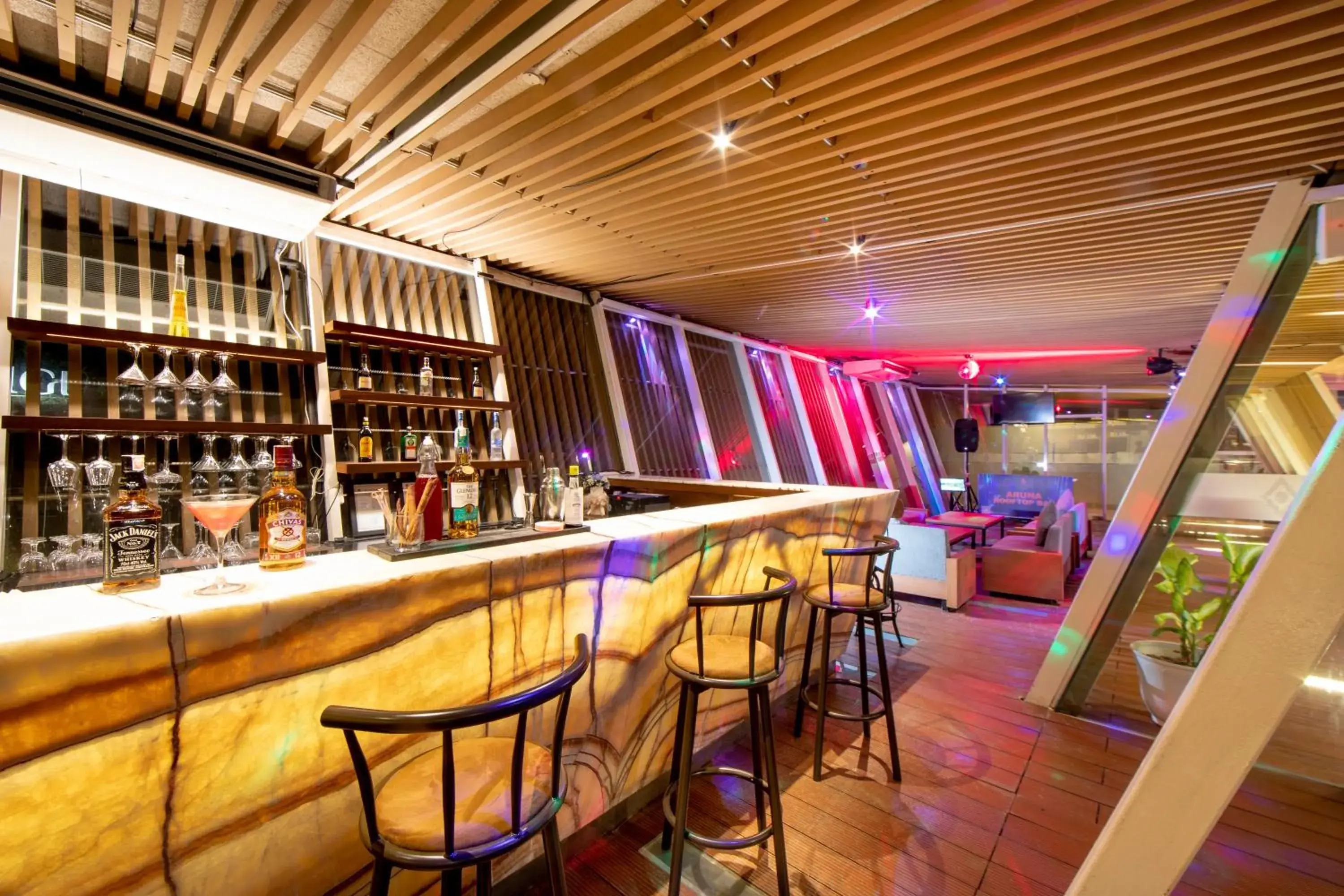 Lounge or bar in Aruna Senggigi Resort & Convention Lounge or bar in Aruna Senggigi Resort & Convention