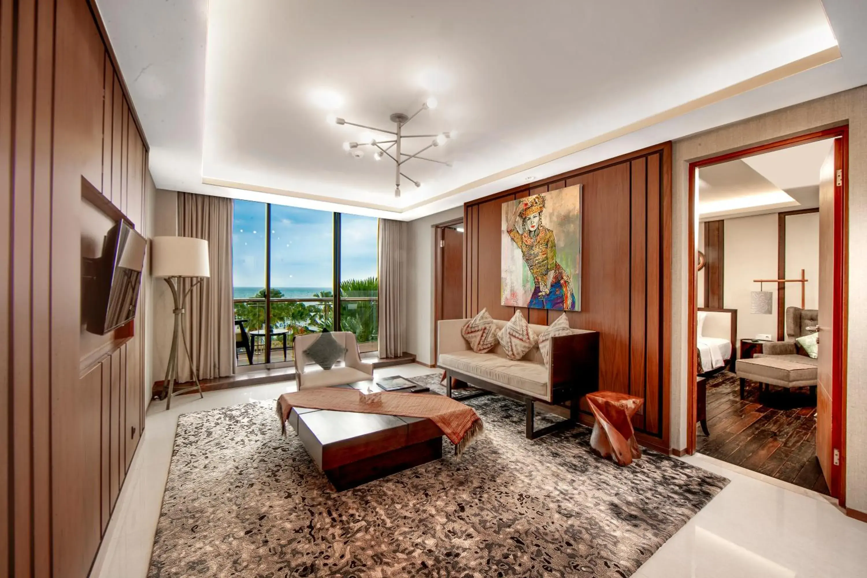 Living room, Bed in Aruna Senggigi Resort & Convention Living room, Bed in Aruna Senggigi Resort & Convention