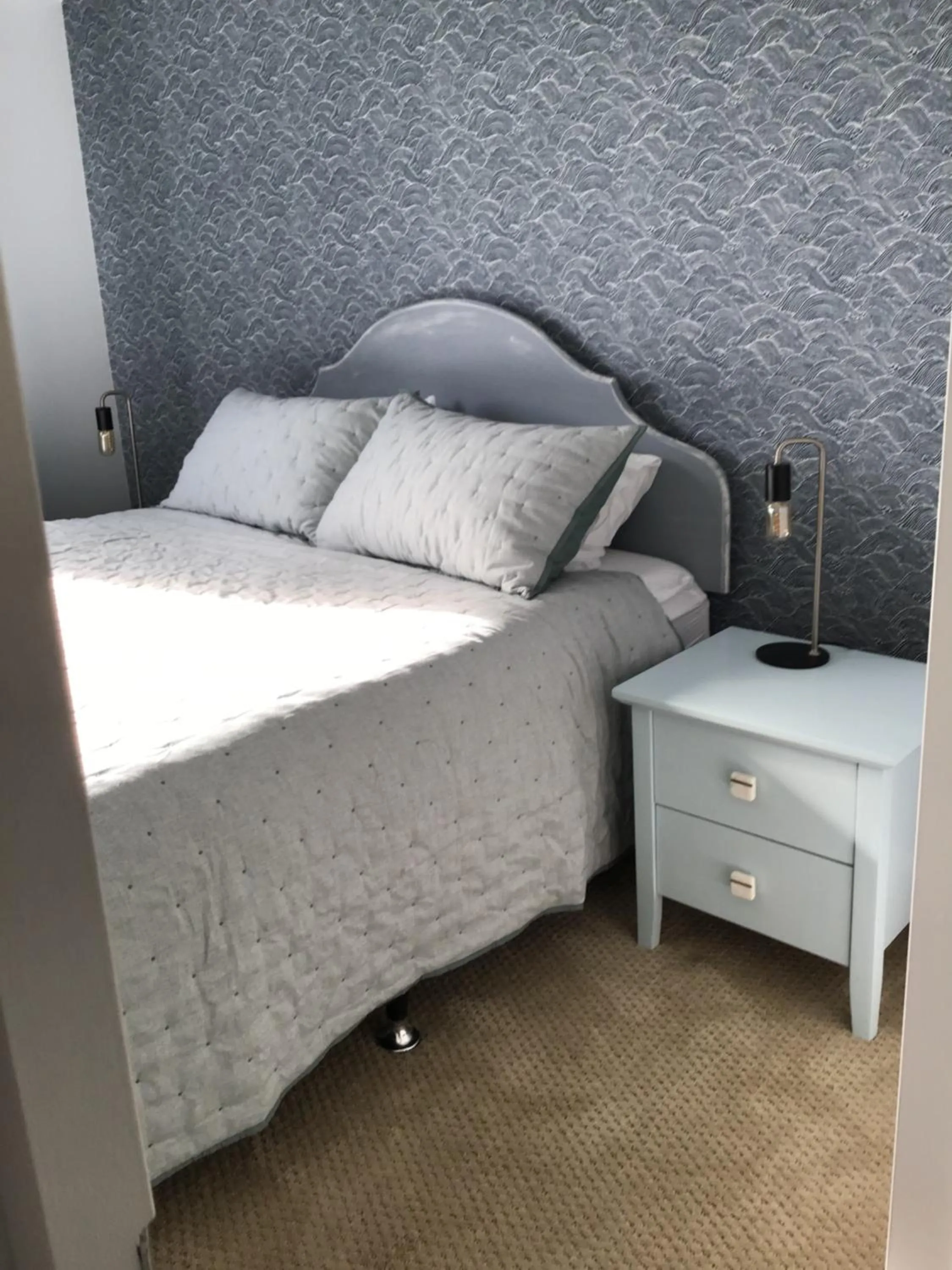 Bed in Fossil Coast B&B