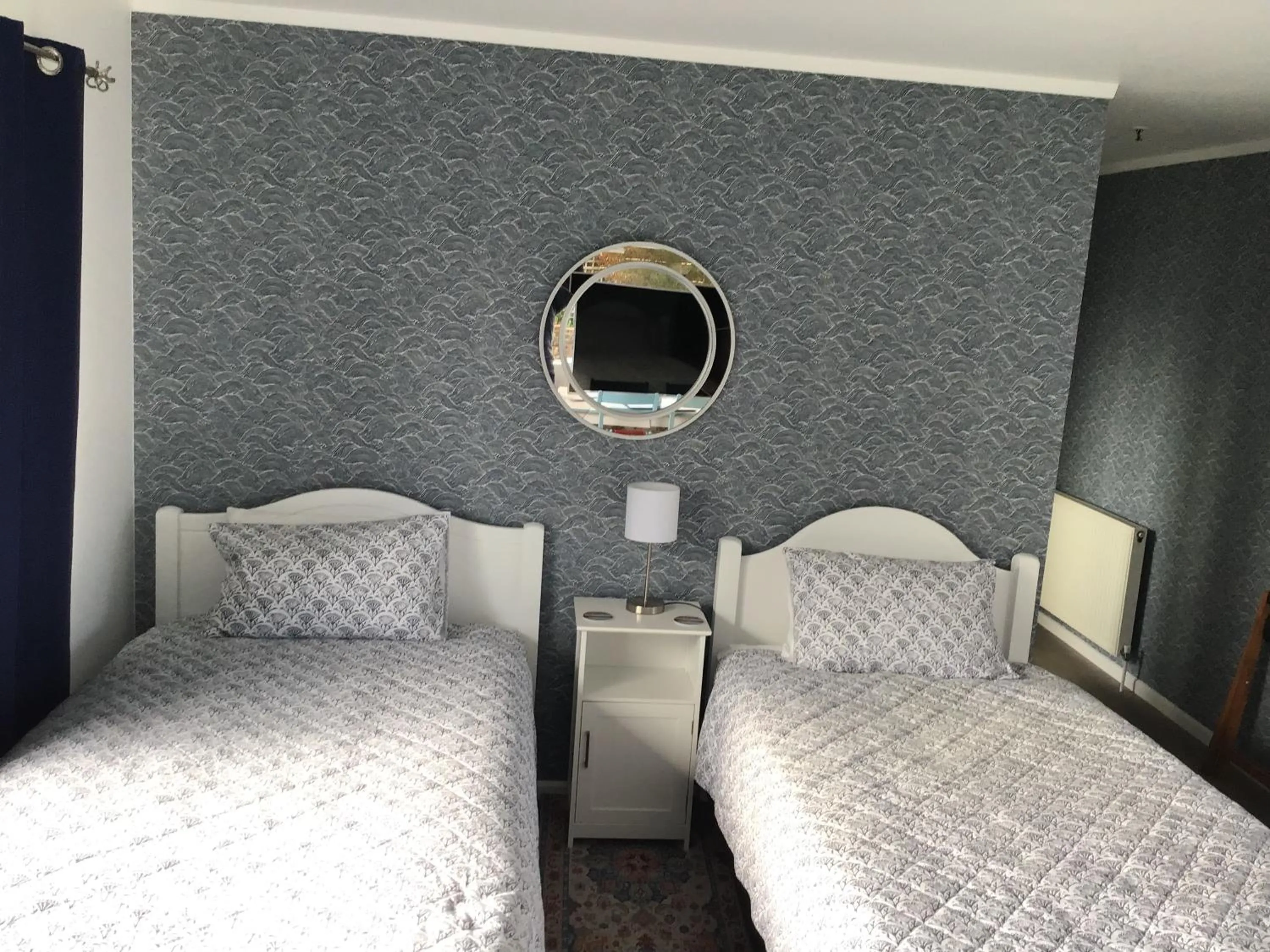 Bed in Fossil Coast B&B