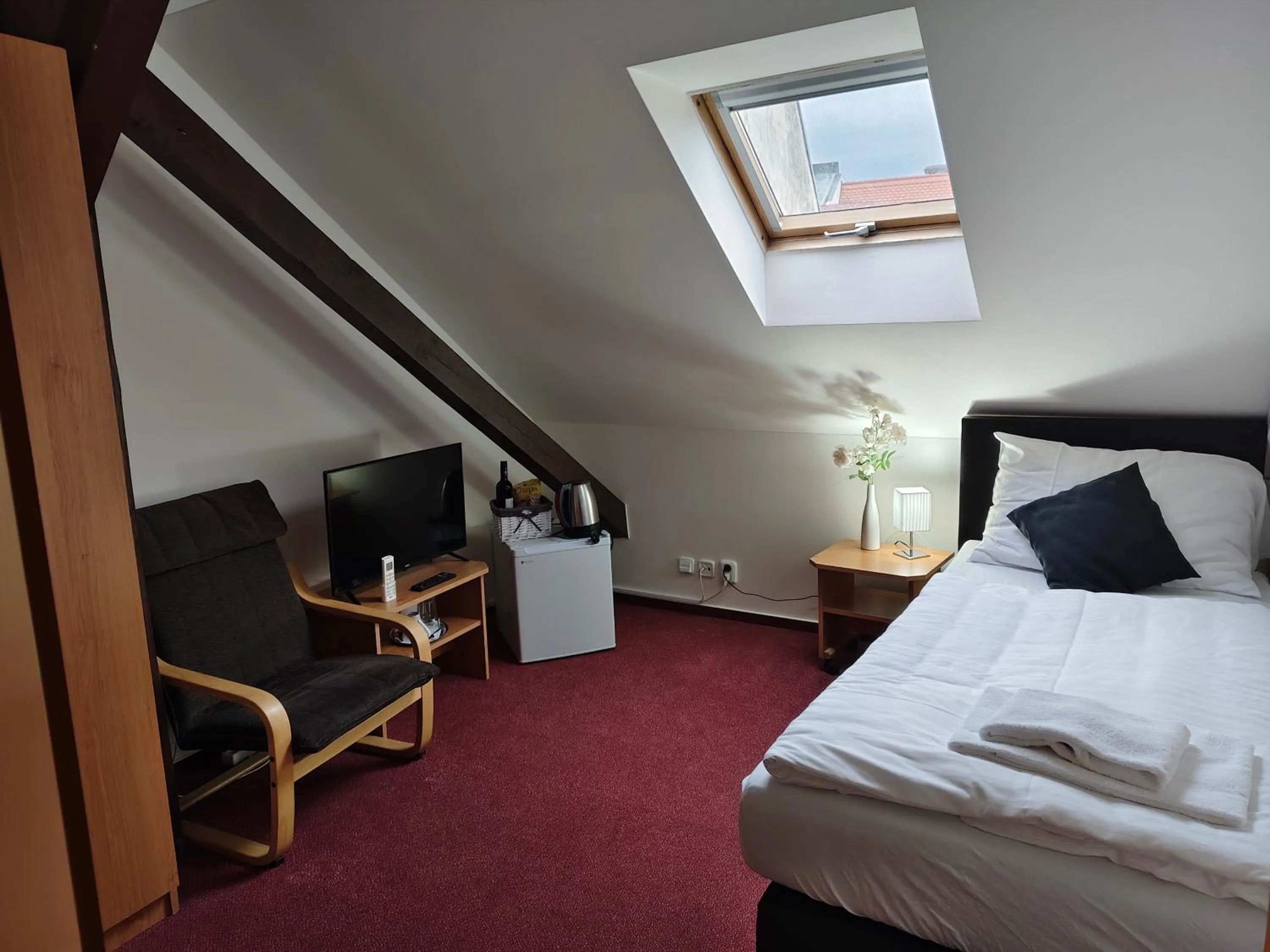 Bed in Hotel Bílý Koníček